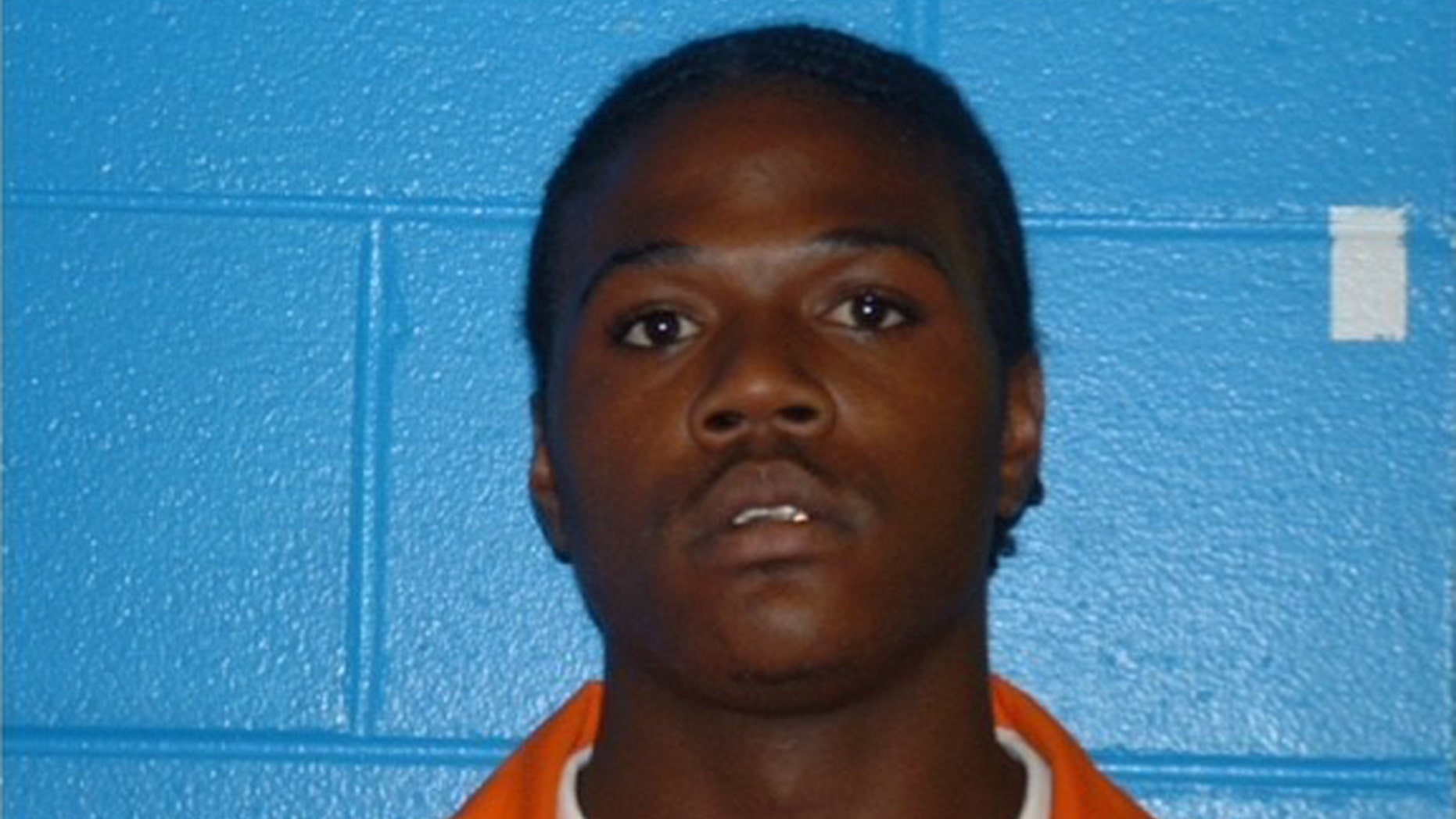 This undated photo released by the Americus Police Department shows Minguell Kennedy. Georgia authorities say they are looking for Kennedy, who they believe is armed and dangerous, in connection with the fatal shooting of one police officer and the wounding of another. (Americus Police Department via AP)