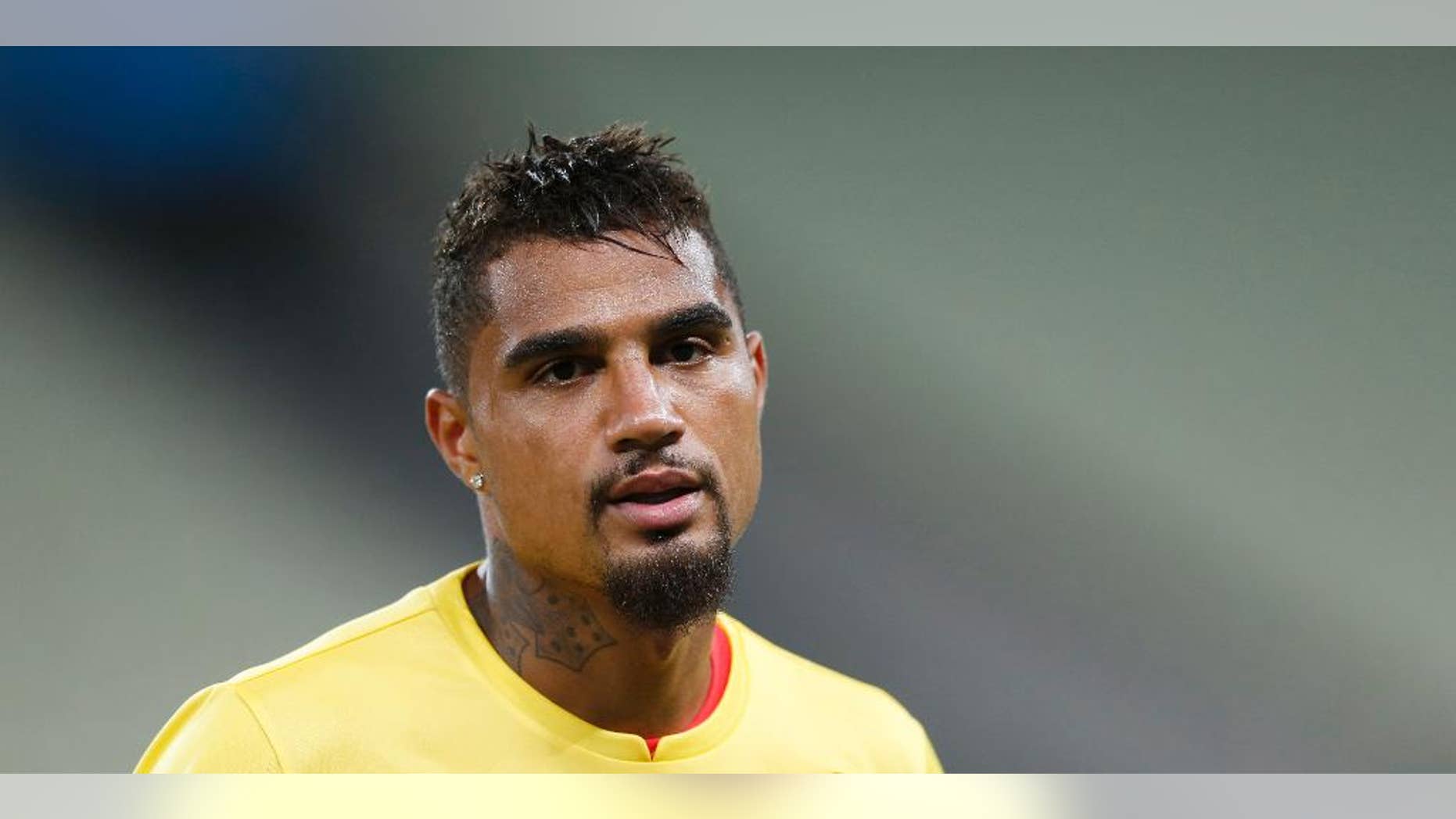 Ghana's Kevin-Prince Boateng warms up during an official training session the day before the group G World Cup soccer match between Germany and Ghana at the Arena Castelao in Fortaleza, Brazil, Friday, June 20, 2014. (AP Photo/Matthias Schrader)