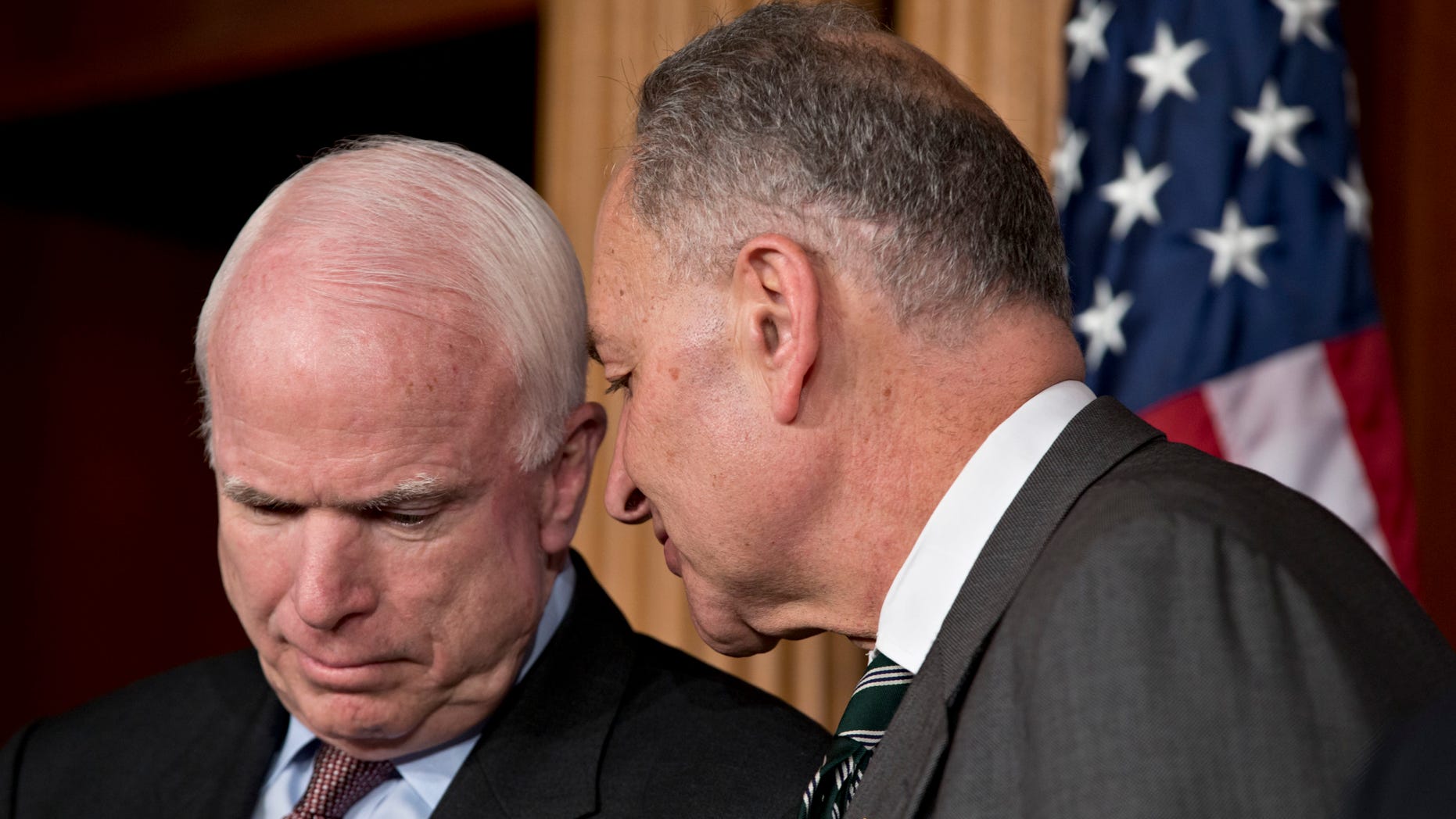 FILE: Jan. 28, 2013: Sens. John McCain, R-Ariz., left, and Charles Schumer, D-N.Y., part of a bipartisan group of senators working on immigration reform, on Capitol Hill, in Washington, D.C.