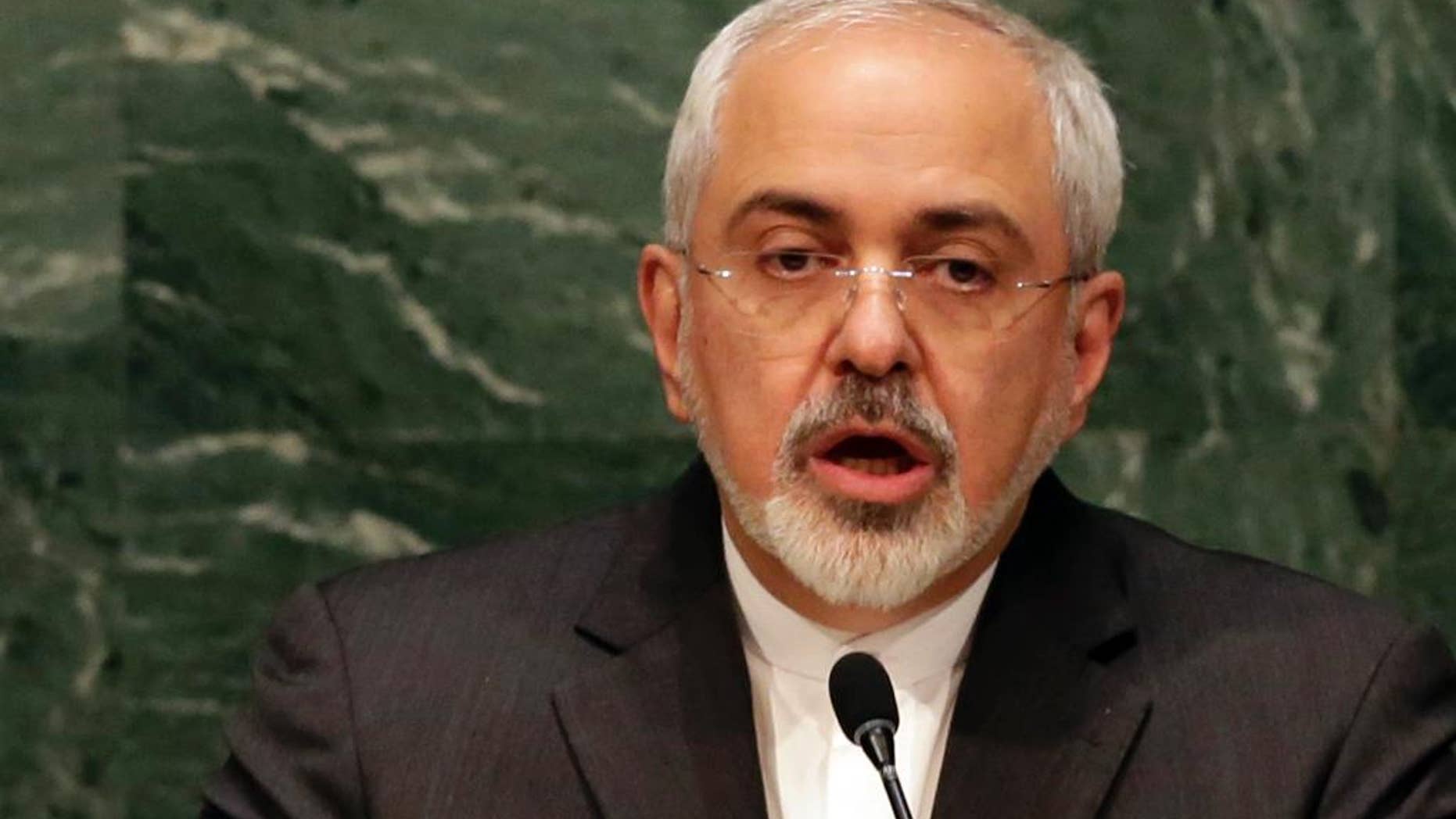 FILE - In this April 27, 2015 file photo, Iran's Foreign Minister Mohammad Javad Zarif addresses the 2015 Nuclear Nonproliferation Treaty (NPT) review conference, in the United Nations General Assembly. Britain has told a U.N. panel of experts that it is aware of an "active Iranian nuclear procurement network" linked to two Iranian companies. The report comes as world powers negotiate with Iran on a possible comprehensive agreement on its nuclear program by June 30. (AP Photo/Richard Drew)