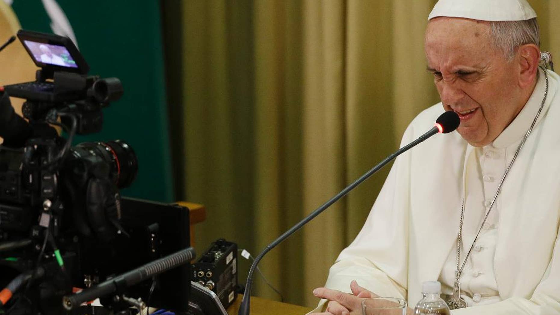 Pope Francis gives his speech in the Synod hall on the occasion of the closing ceremony of the IV Scholas Occurrentes World Educational Congress, at the Vatican, Thursday, Feb. 5, 2015. (AP Photo/Gregorio Borgia)