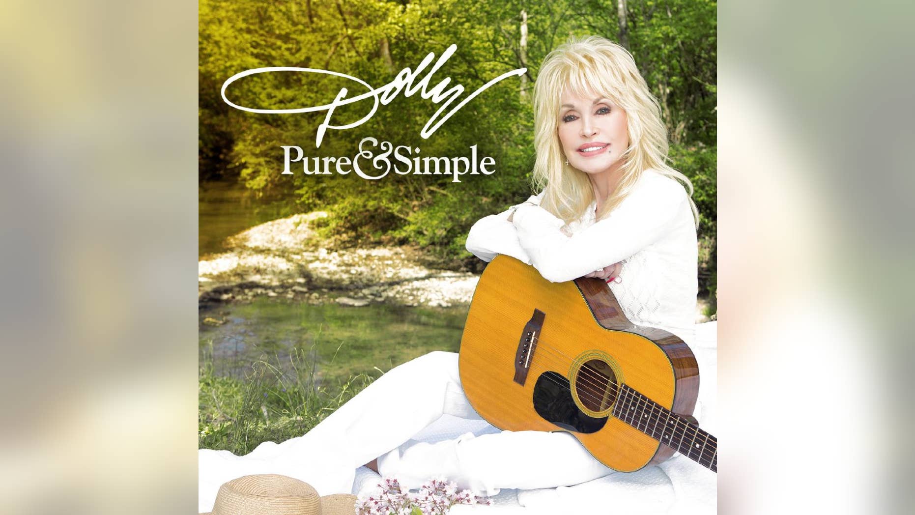 This CD cover image released by Sony Music Nashville shows "Pure & Simple," the latest release by Dolly Parton. (Sony Music Nashville via AP)