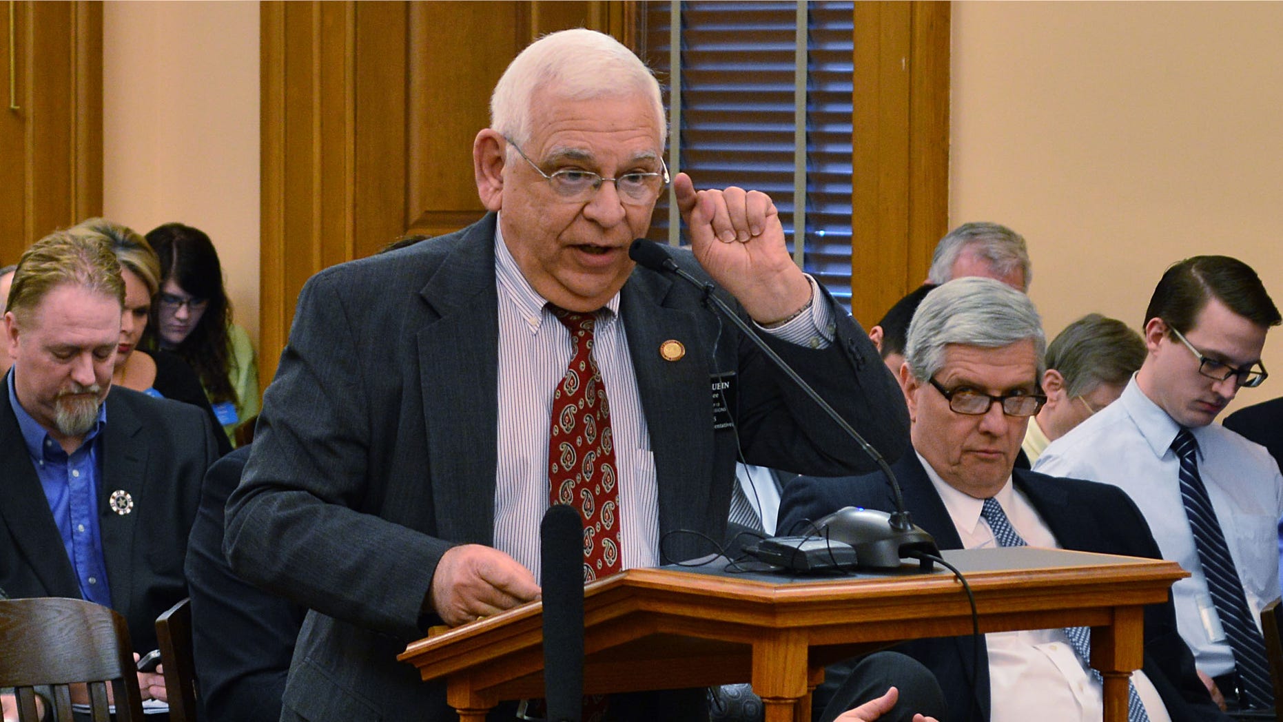 Kansas state Rep. John Rubin, a Shawnee Republican, testifies during a House Education Committee hearing in favor of a bill to repeal a law giving a tuition break to some higher education students brought to the U.S. illegally by their parents, Tuesday, Feb. 24, 2015, at the Statehouse in Topeka, Kan.