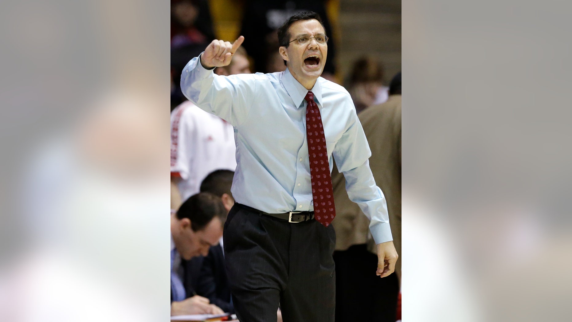 Nebraska head coach Tim Miles yells to his team during the first half of an NCAA college basketball game against Northwestern in Evanston, Ill., on Saturday, Feb.8, 2014. Nebraska won 53-49. (AP Photo/Nam Y. Huh)