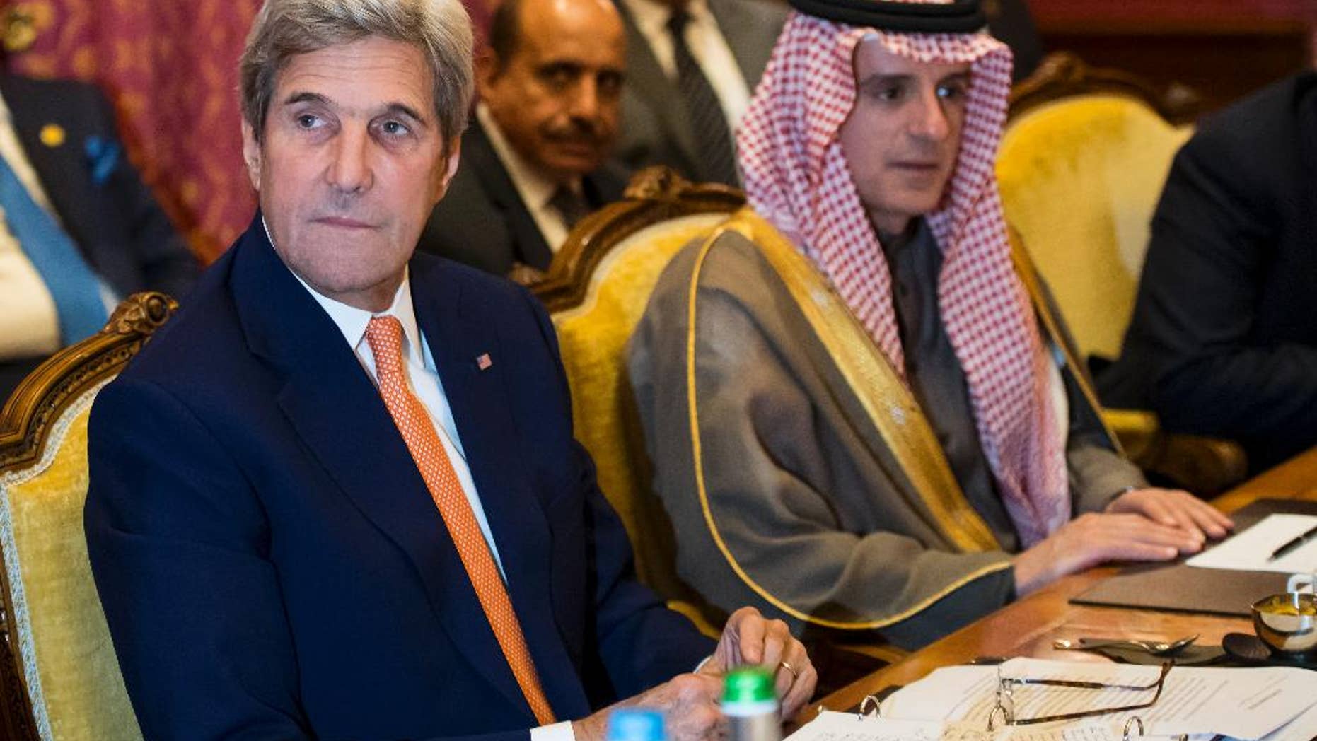 U.S. Secretary of State John Kerry, left, and Saudi Arabia's Foreign Minister Adel al-Jubeir, right, attend a meeting where they discussed the crisis in Syria, in Lausanne, Switzerland, Saturday, Oct. 15, 2016. (Jean-Christophe Bott/Pool Photo via AP)