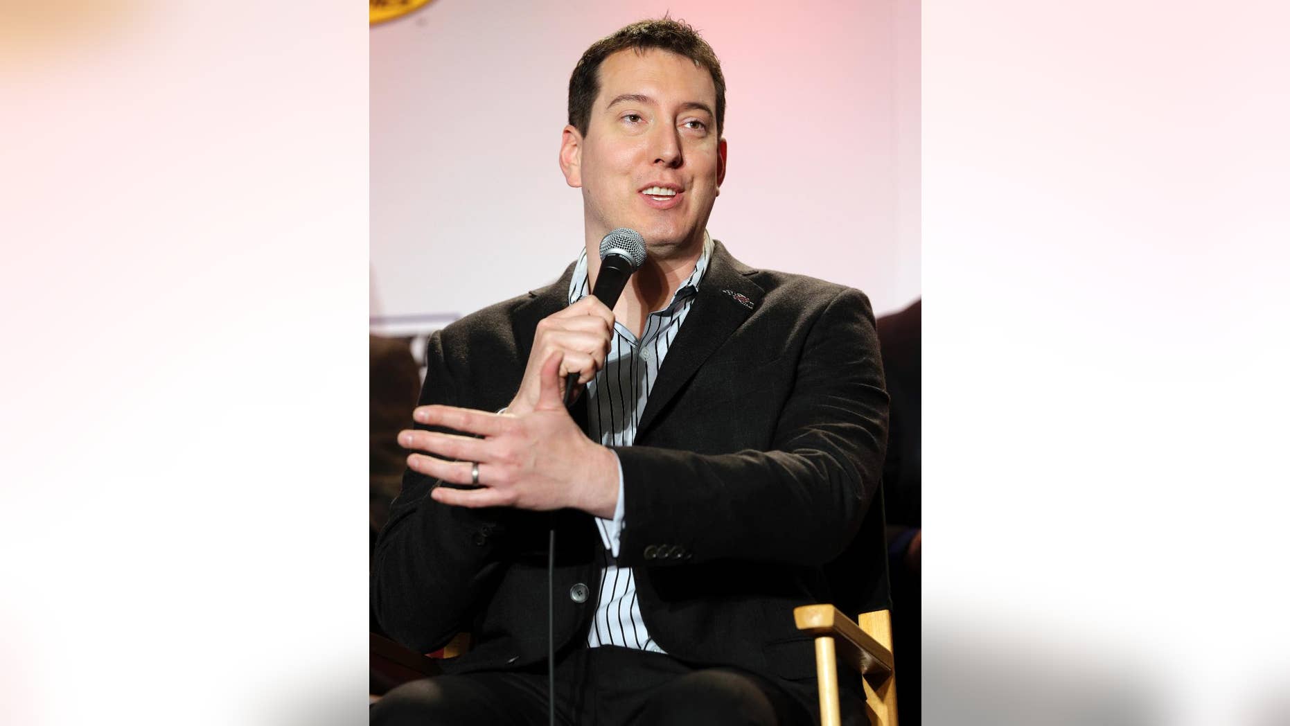 Driver Kyle Busch speaks to the media during the NASCAR Charlotte Motor Speedway Media Tour in Charlotte, N.C., Monday, Jan. 26, 2015. (AP Photo/Chuck Burton)