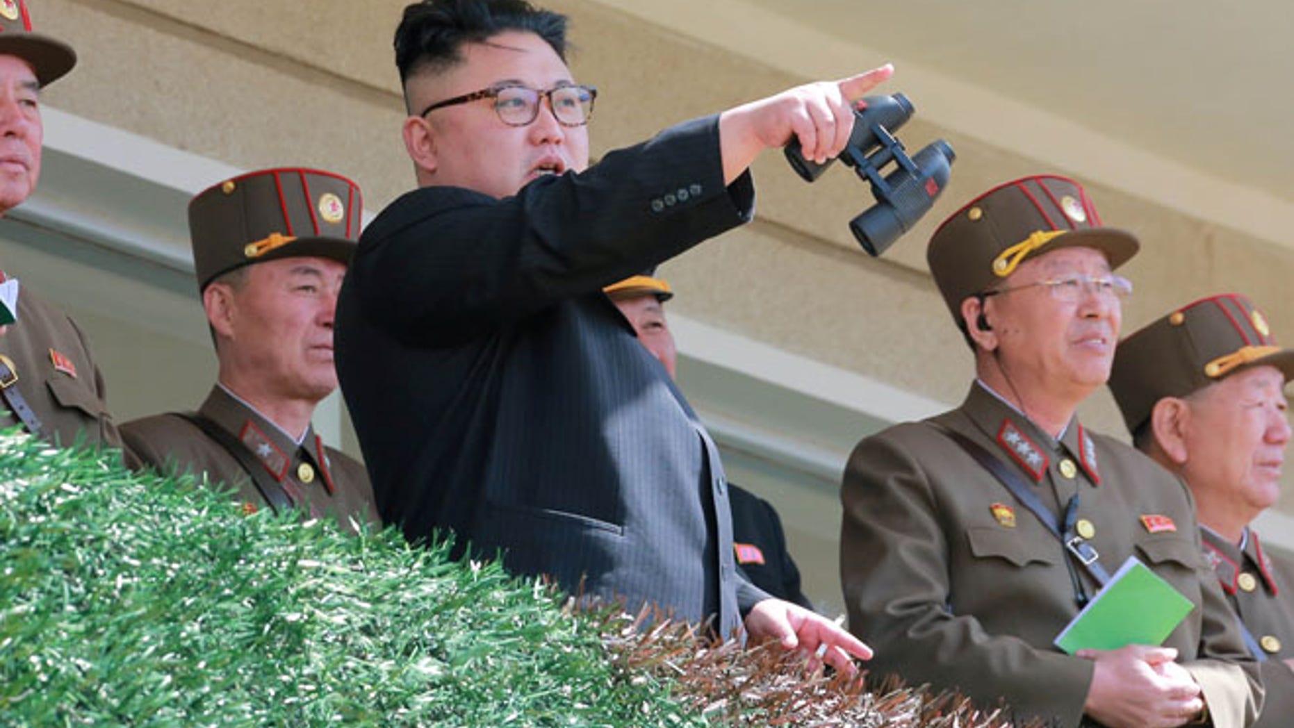 North Korean Leader Kim Jong Un observes a target-striking contest by the Korean People's Army