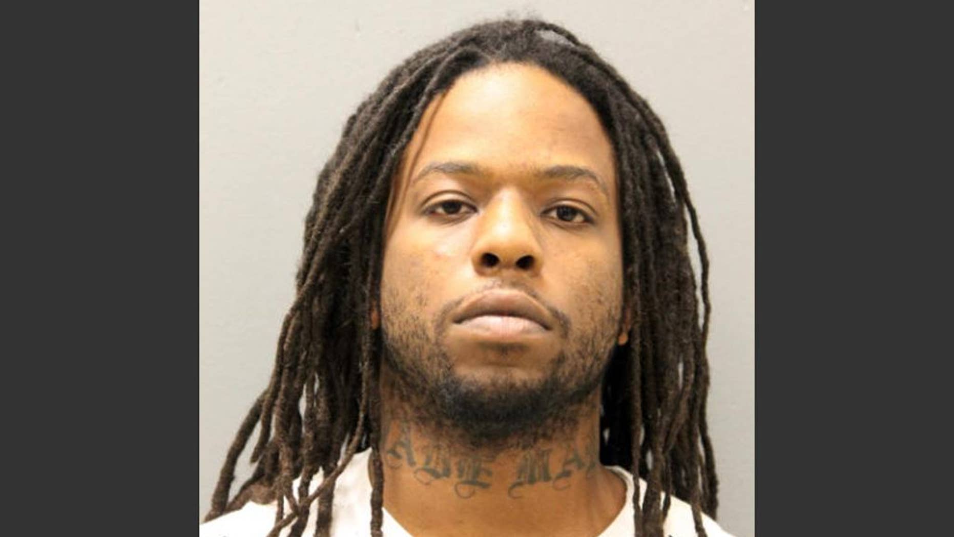 This photo provided by the Chicago Police Department shows Corey Morgan. Morgan was charged with first-degree murder on Friday, Nov. 27, 2015, in connection to the slaying of a 9-year-old boy who police say was lured off a basketball court and shot in the head in an alley because of his father's gang ties. (Chicago Police Department via AP)