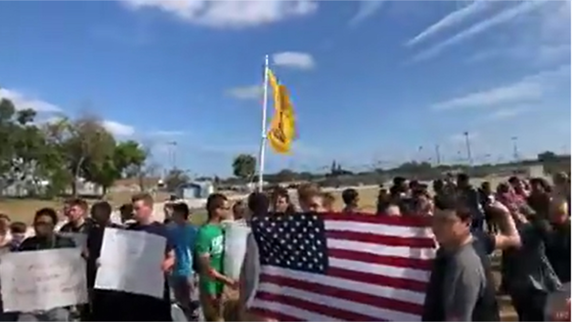 Students walking out Friday as part of a protest supporting the Second Amendment right to bear arms.