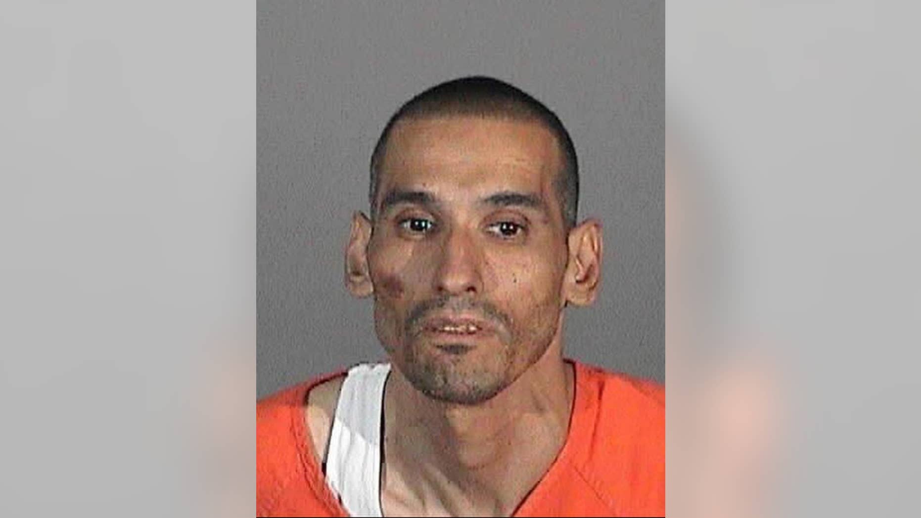 This Friday, Dec. 6, 2014 photo released by the Montebello Police Department, shows suspect Daniel Perez. Perez is accused of abducting his four sons and engaging police in a highway standoff. Perez has been booked into Montebello jail, about 15 miles east of Los Angeles, for investigation of his wife's death as well as kidnapping. Erica Perez was found dead in the trunk of another family vehicle on Wednesday. (AP Photo/Montebello Police Department)