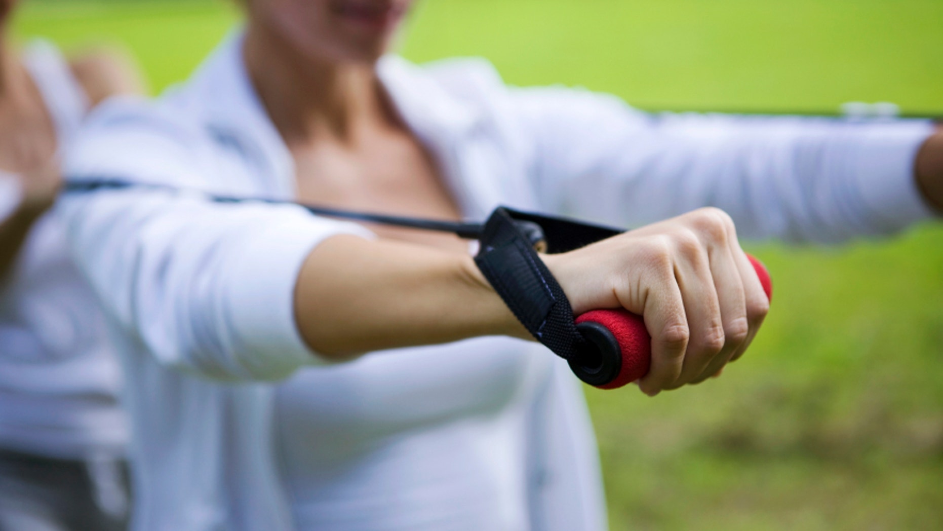 Exercising with resistance band, Canon 1Ds mark III