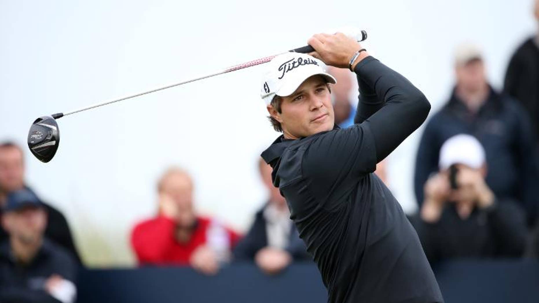 US golfer Peter Uihlein looks on after playing a shot as he takes part in The Alfred Dunhill Links Championships on Kings Barns near St Andrews, Fife, Scotland on September 27, 2013.