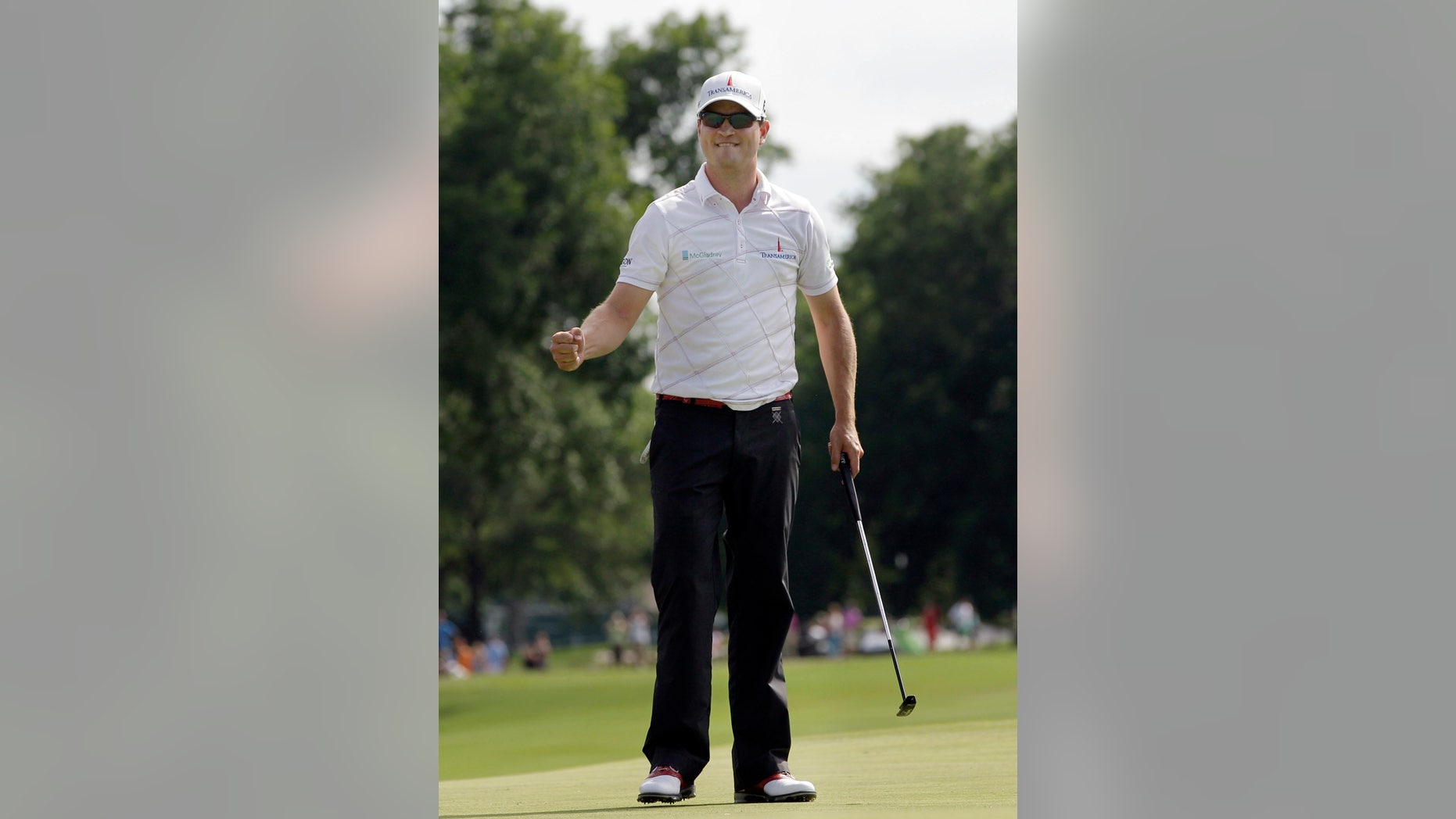 FILE - In this May 27, 2012, file photo, Zach Johnson pumps his fist after winning the Colonial golf tournament in Fort Worth, Texas. Johnson has won two of the last three Colonials. A trip to Hogan's Alley may be just what he needs. Johnson, who doesn't have a top-10 finish this season, is the only golfer in three decades with four consecutive top 10s at Colonial. (AP Photo/LM Otero, File)