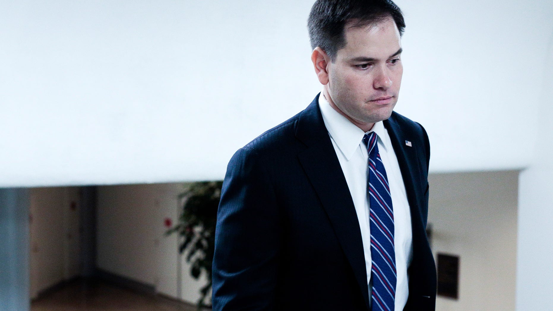 MARCH 19: U.S. Sen. Marco Rubio (R-FL) heads to the weekly Senate Republicans policy luncheon in Washington, DC. Rubio has been a vocal Republican advocate for immigration reform.
