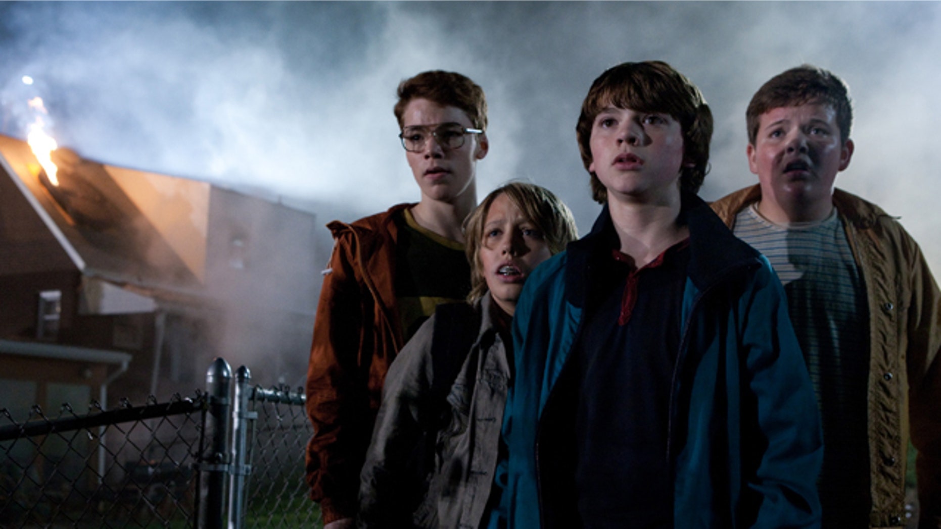 In this film publicity image released by Paramount Pictures, from left, Gabriel Basso, Ryan Lee, Joel Courtney and Riley Griffiths are shown in a scene from "Super 8" J.J. Abrams' latest sci-fi thriller opens nationwide Friday, June 10, 2011.