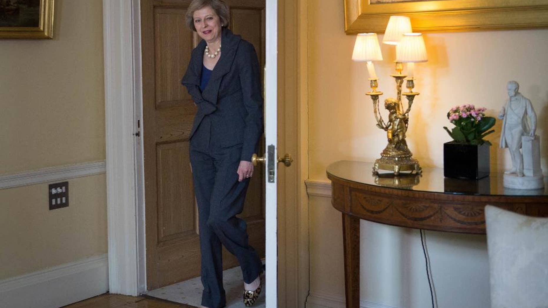 Britain's Prime Minister Theresa May, arrives for a meeting with Irish Prime Minister Enda Kenny inside 10 Downing Street, London, ahead of the latest meetings on how Brexit will unfold, on Tuesday, July 26, 2016. (Stefan Rousseau/Pool via AP)