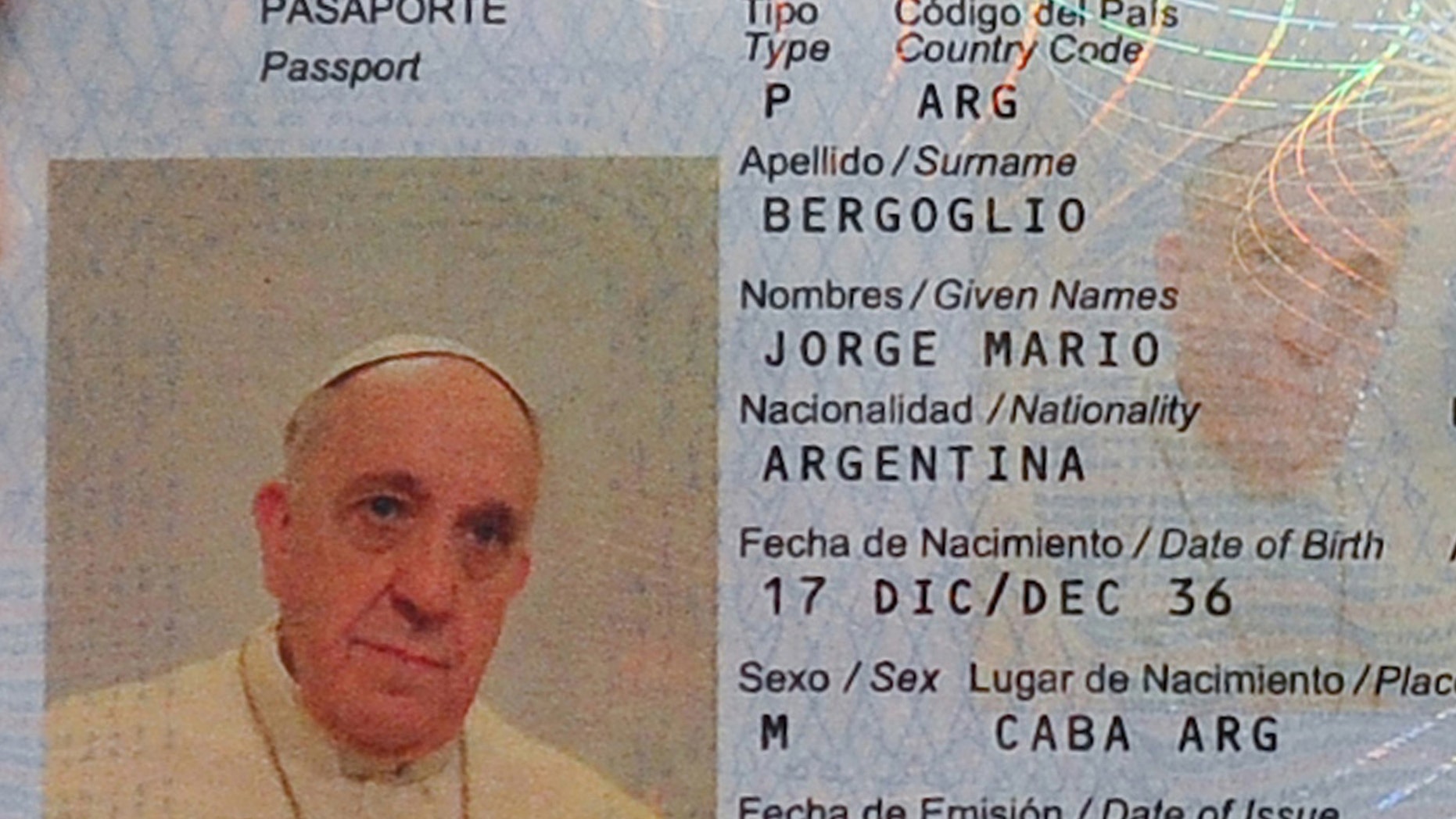 This photo released by Argentina's Interior Ministry shows the new passport of Jorge Mario Bergoglio, Pope Francis, at the Argentine Consulate in Rome, Italy, Friday, Feb. 14, 2014. Argentina’s ambassador to the Holy See, Juan Pablo Cafiero said he and his deputy went to the Pope’s hotel in the Vatican gardens last Friday to take Francis’ photo and digital fingerprints because the Pope’s passport was due to expire and he wanted to renew it. (AP Photo/Argentina's Interior Ministry)