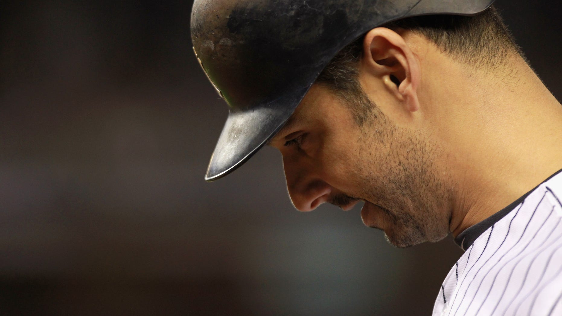Oct 6: Jorge Posada of the New York Yankees walks back to the dugout with his head down after he grounded out in the bottom of the eighth inning against the Detroit Tigers during Game Five of the American League Championship Series at Yankee Stadium.