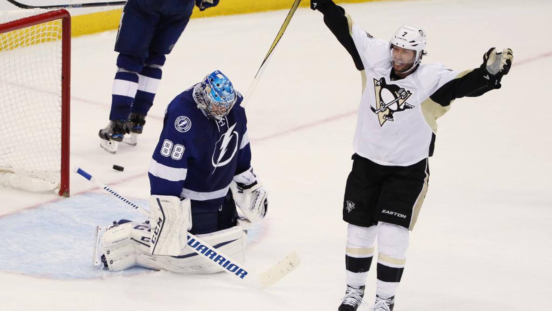 May 24, 2016: Pittsburgh Penguins center Matt Cullen (7) celebrates a goal by teammate Sidney Crosby (87), as Tampa Bay Lightning goalie Andrei Vasilevskiy (88) remains kneeling on the ice during the second period of Game 6 of the NHL Eastern Conference finals in Tampa, Fla.