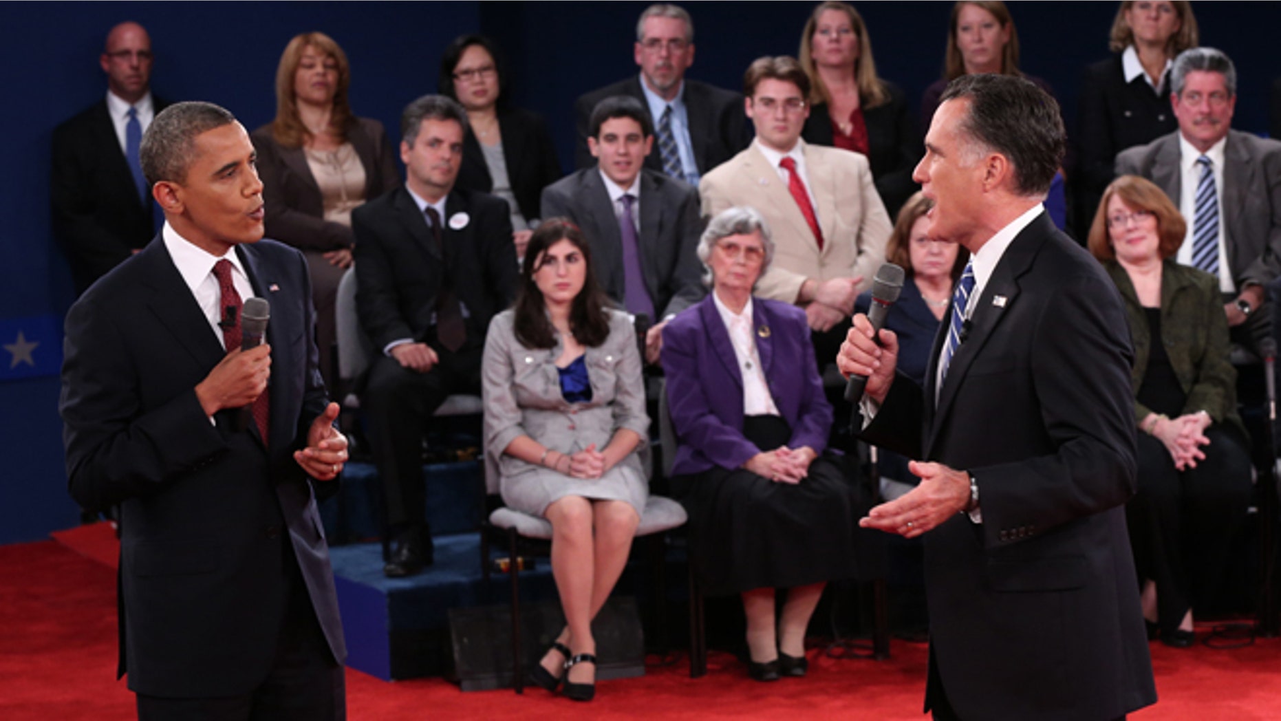 Oct. 16, 2012: President Barack Obama and Republican presidential nominee Mitt Romney confront each other during the second presidential debate at Hofstra University in Hempstead, N.Y.