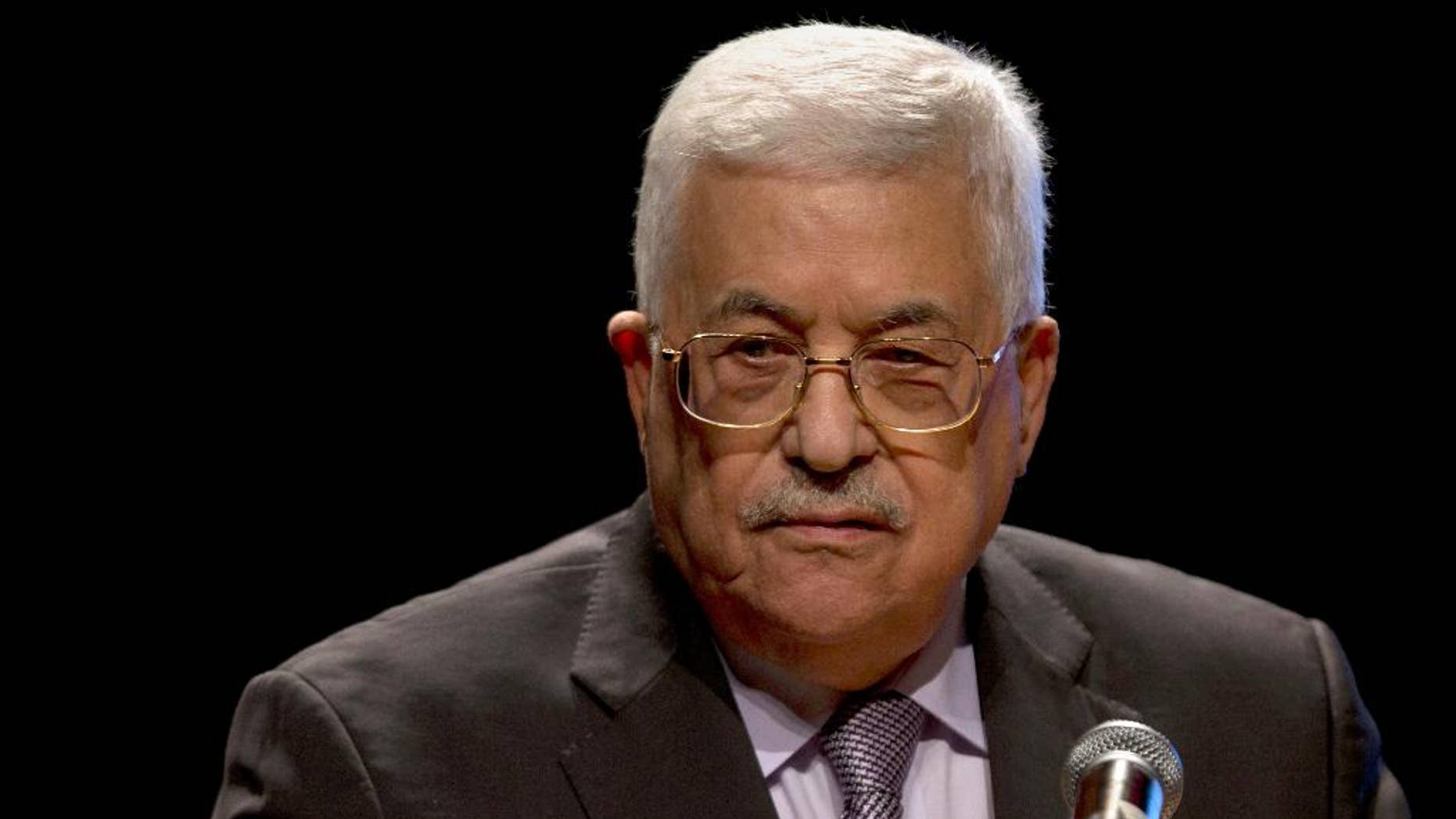 FILE -- In this Saturday, Oct. 1, 2016 file photo, Palestinian President Mahmoud Abbas, speaks during a conference in the West Bank City of Bethlehem. A West Bank hospital official said Thursday, Oct. 6, 2016, that Abbas will undergo a heart test after being hospitalized. The official says Abbas, 81, will undergo a cardiac catheterization, a procedure in which a thin tube is inserted into a blood vessel to examine the strength of his heart. (AP Photo/Majdi Mohammed)