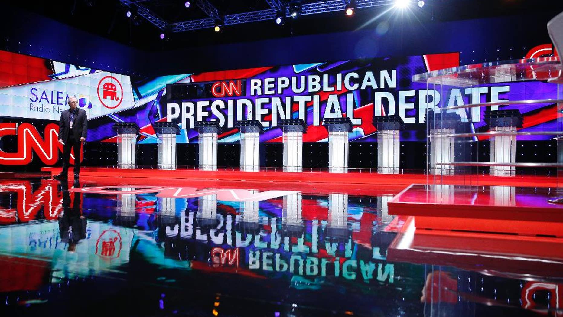 Podiums line the stage before the CNN Republican presidential debate at the Venetian Hotel & Casino on Tuesday, Dec. 15, 2015, in Las Vegas. (AP Photo/John Locher)