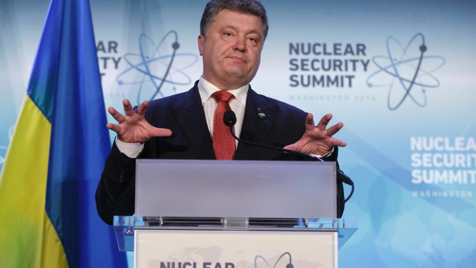 Ukrainian President Petro Poroshenko holds a news conference after meetings at the Nuclear Security Summit in Washington, Friday, April 1, 2016. (AP Photo/J. Scott Applewhite)