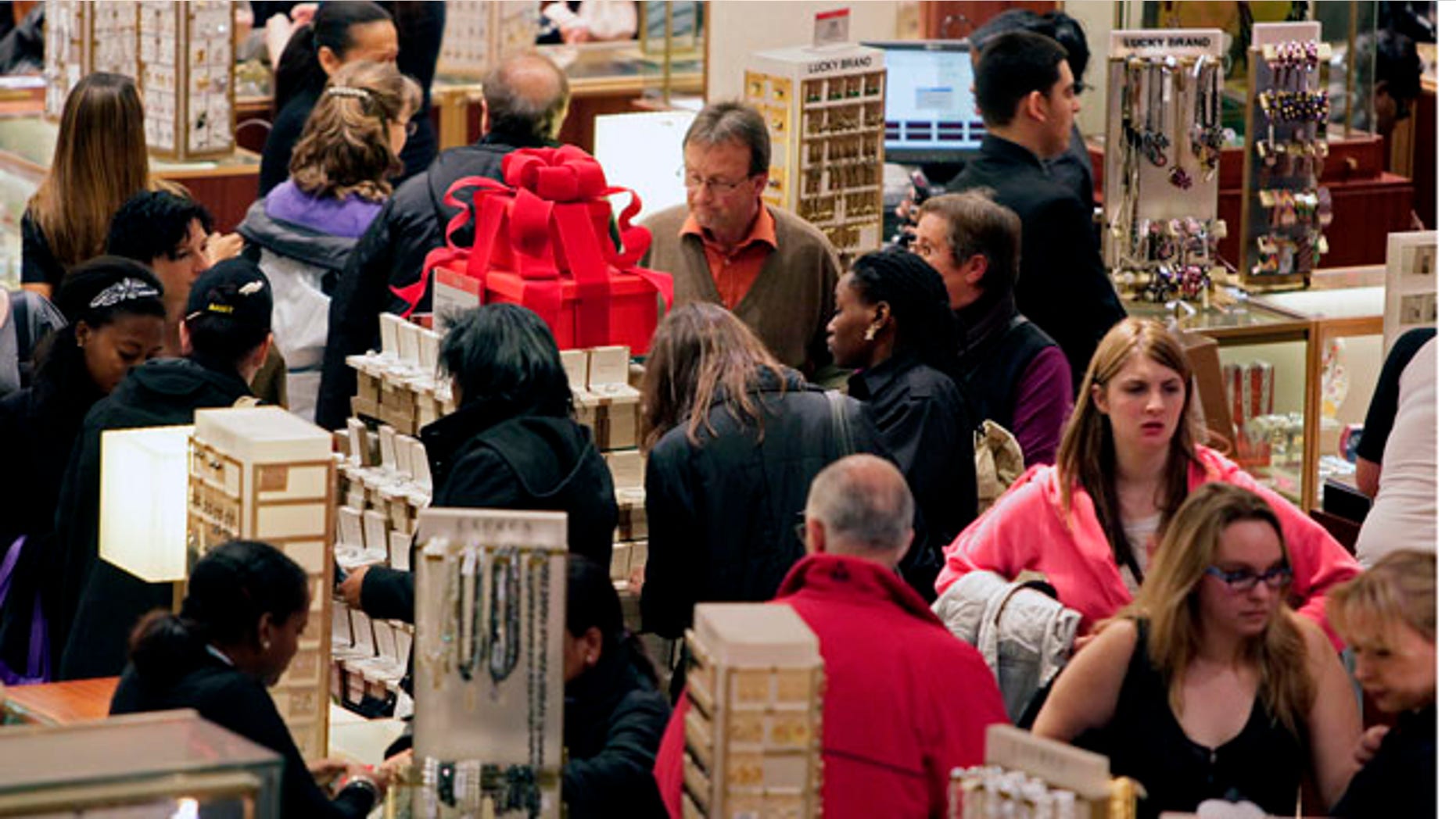 Macy's aisles are crowded with shoppers on Black Friday called that because the surge of shoppers could take retailers into profitability, on Friday, Nov. 26, 2010, in Manhattan, New York. (AP Photo/Bebeto Matthews)