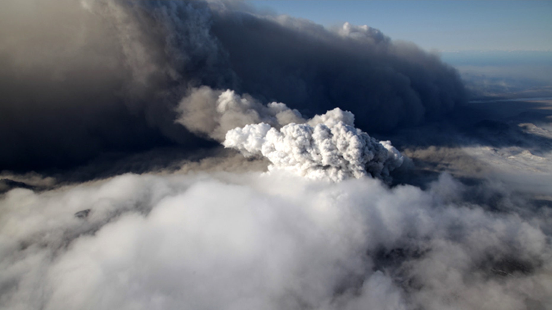 April 19: This aerial photo shows a plume of ash rising from the volcano in southern Iceland's Eyjafjallajokull glacier.