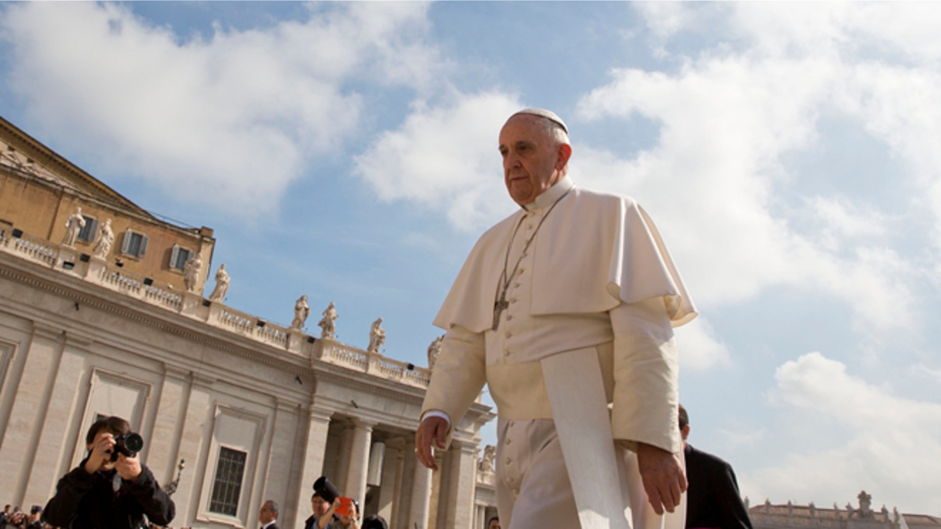 Pope Francis arrives for his weekly general audience in St. Peter's Square at the Vatican, Wednesday, April 29, 2015. (AP Photo/Alessandra Tarantino)