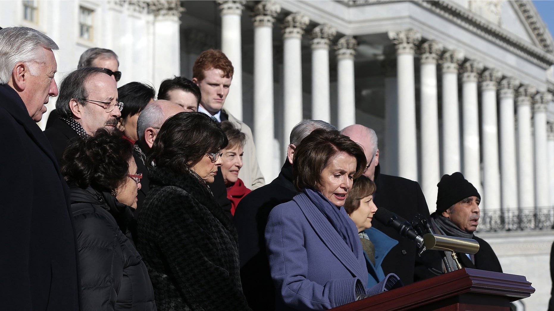 WASHINGTON, DC - FEBRUARY 13: House Minority Leader Nancy Pelosi (D-CA), joined by other members of the House Democratic caucus, speaks during a news conference on the steps of the U.S. Capitol February 13, 2015 in Washington, DC. House Democrats held the news conference to call on House Republicans to pass a "clean" funding bill for the Department of Homeland Security. (Photo by Win McNamee/Getty Images)