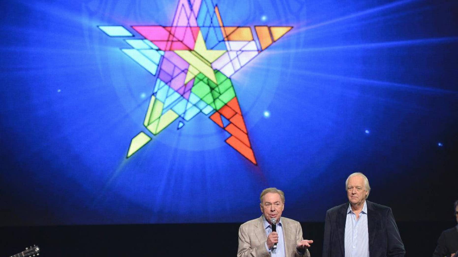 FILE - In this April 4, 2014 file photo, composer Andrew Lloyd Webber, left, and lyricist Tim Rice announce the new "Jesus Christ Superstar" North American arena tour at a press conference in New York. NBC announced Wednesday, May 10, 2017, that it will bring to broadcast television “Jesus Christ Superstar Live!,” the iconic 1971 Broadway rock opera by Webber and Rice. They will serve as executive producers with Marc Platt, Craig Zadan and Neil Meron. (Photo by Evan Agostini/Invision/AP, File)
