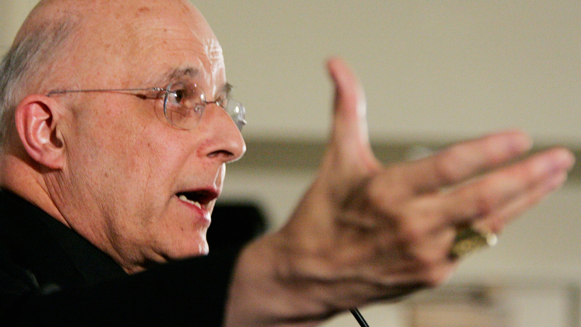 In this Jan. 28, 2006 file photo, Cardinal Francis George responds to allegations of sexual abuse by Chicago priest Rev. Daniel McCormack from St. Agatha Church, during a news conference in Chicago. The Archdiocese of Chicago on Wednesday, Jan 15, 2014, will hand over thousands of pages of documents involving clergy sex abuse to victims’ attorneys, who plan to make them public next week as part of a years-long attempt to hold the Church accountable for its handling of abuse allegations.