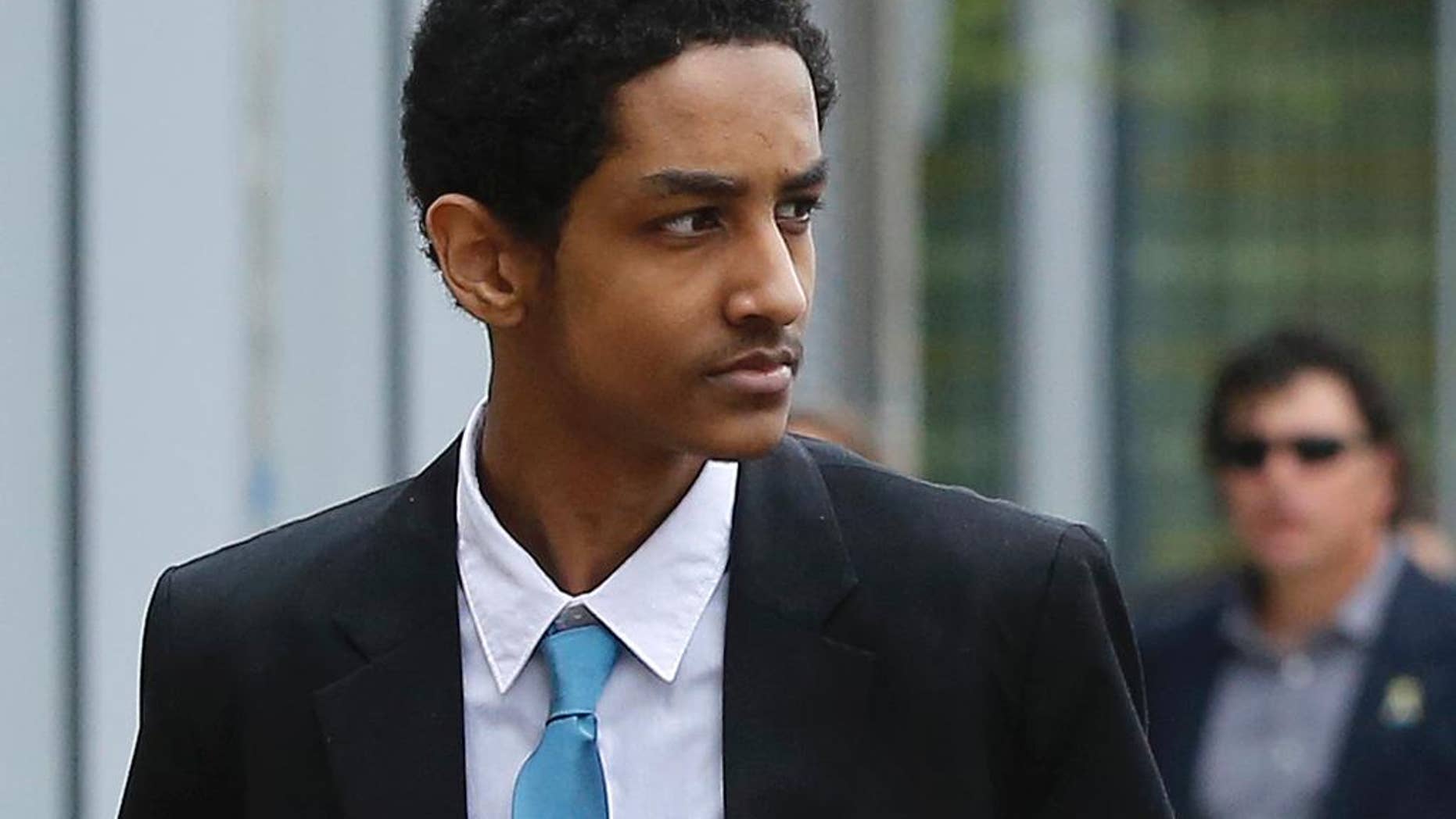 FILE - In this May 15, 2014 file photo, Robel Phillipos, a college friend of Boston Marathon bombing suspect Dzhokhar Tsarnaev, arrives at federal court before a hearing in Boston. Lawyers for Phillipos, a U.S. citizen who is charged with lying to investigators after last year's fatal bombing, filed a change of venue motion Monday, Sept. 22, 2014. The motion seeks to have his federal trial, scheduled to start the following week, moved from Boston to Springfield; Providence, R.I., or Portland, Maine. (AP Photo/Steven Senne, File)