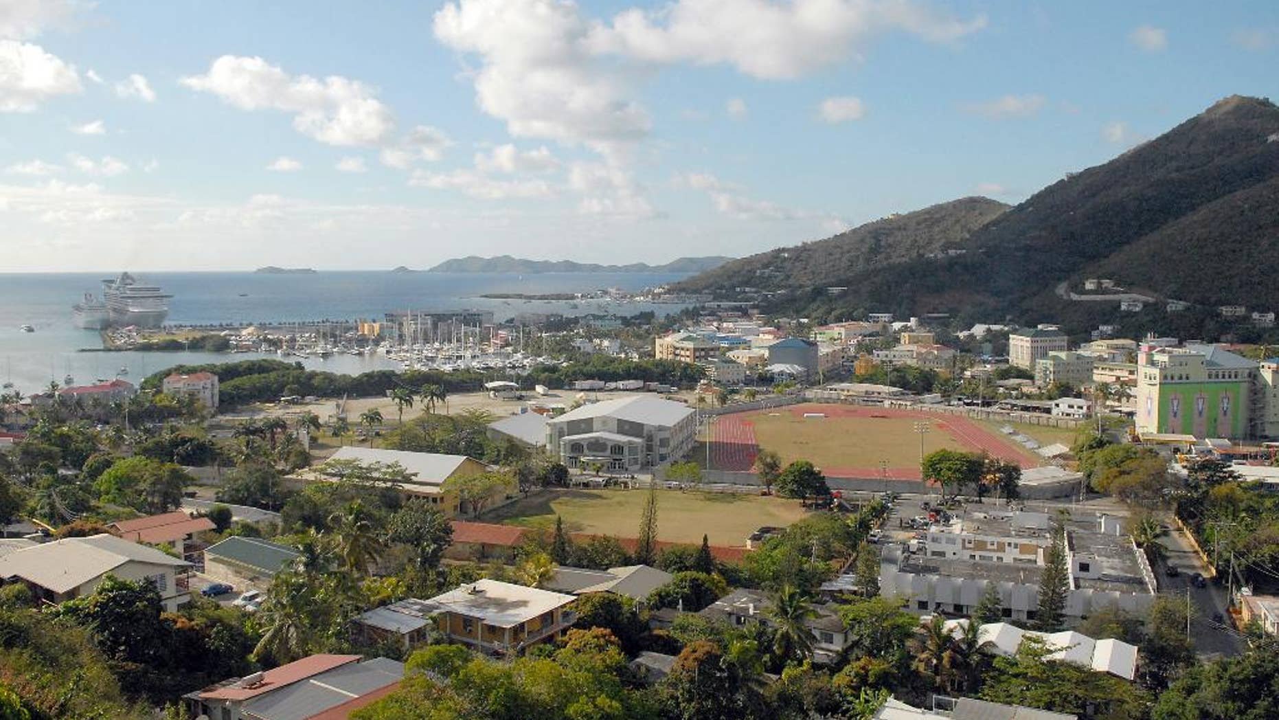 FILE - This April 3, 2009 file photo shows a general view of Road Town, Tortola in the British Virgin Islands. A thriving financial services industry that evolved over the last 30 years, the British Virgin Islands has come under scrutiny like never before thanks to the leak of confidential documents from a Panama-based law firm that specializes in offshore finance. (AP Photo/Todd VanSickle, File)