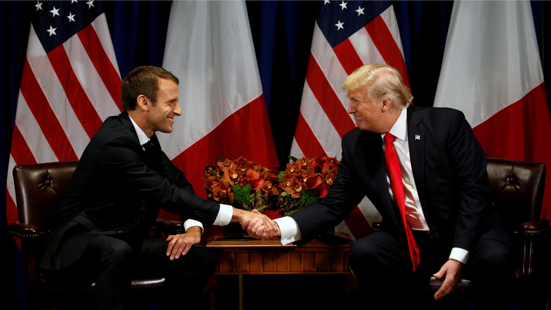 Trump and French President Emmanuel Macron shake hands during a meeting on the sidelines of the United Nations General Assembly in New York this past September.