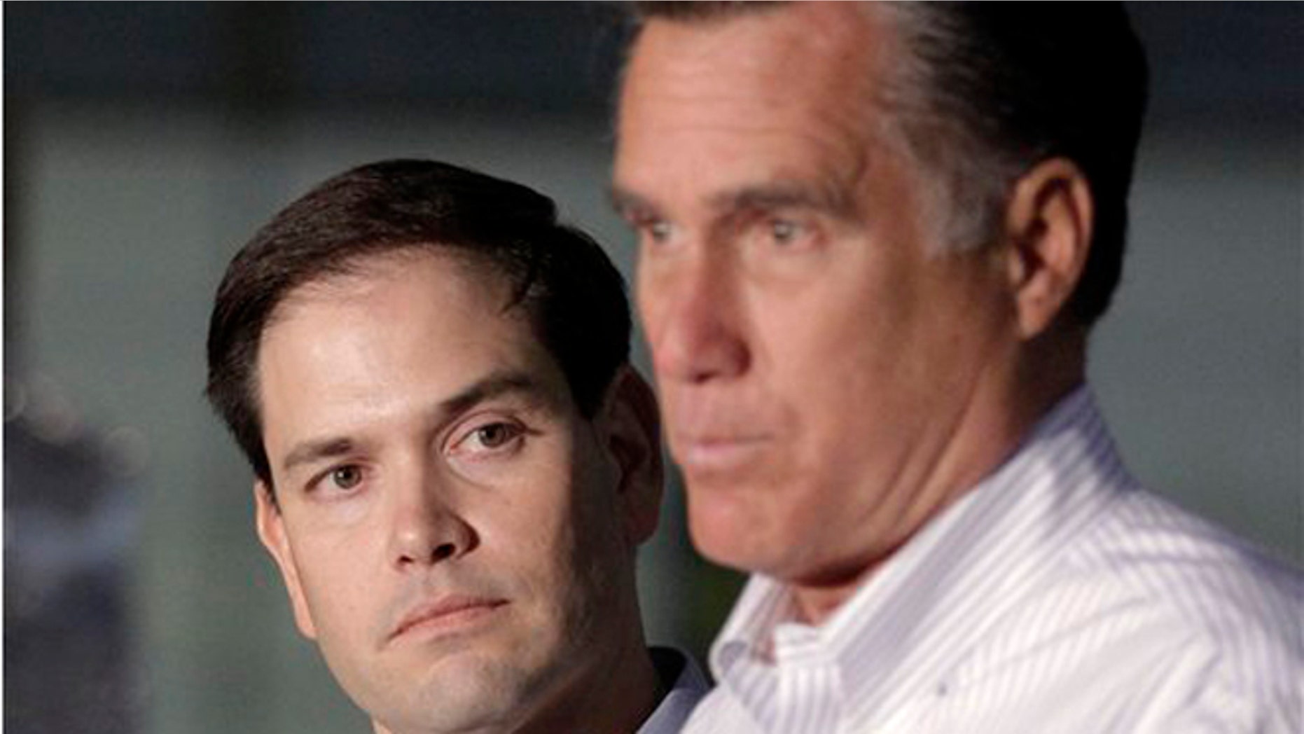 2012: Sen. Marco Rubio, R-Fla. listens at left as GOP presidential candidate Mitt Romney speaks in Aston, Pa.