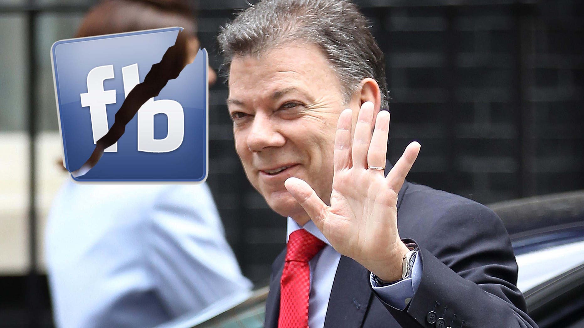LONDON, ENGLAND - JULY 05: Colombian president elect Juan Manuel Santos waves as he arrives in Downing Street to meet with Prime Minister David Cameron on July 5, 2010 in London, England. President elect Santos was elected on May 20, 2010 and will become President on August 7, 2010. (Photo by Peter Macdiarmid/Getty Images)