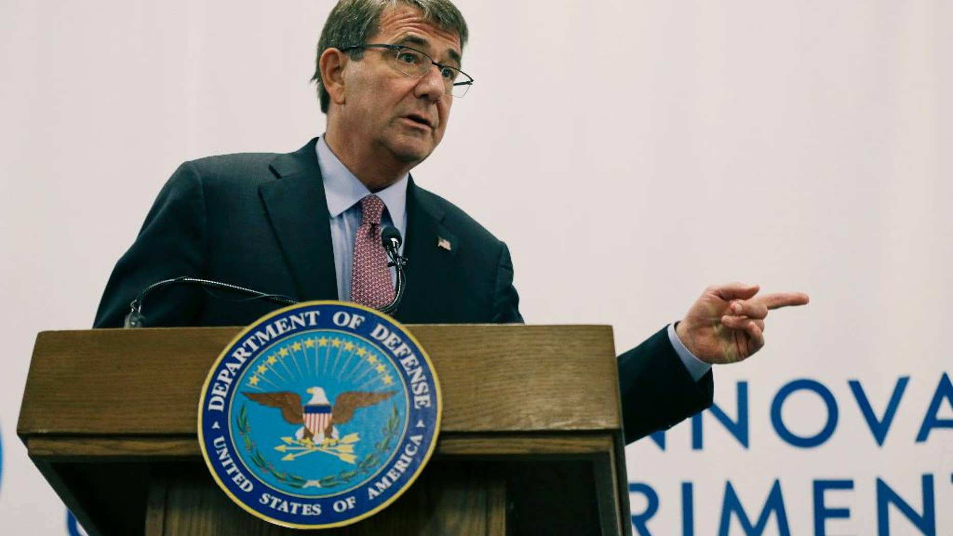 FILE - In this July 26, 2016 file photo, Defense Secretary Ash Carter speaks during a news conference in Cambridge, Mass. The U.S. is exploiting an enormous amount of digital information about the Islamic State obtained by Syrian rebels fighting for control of the city of Manbij. (AP Photo/Elise Amendola)