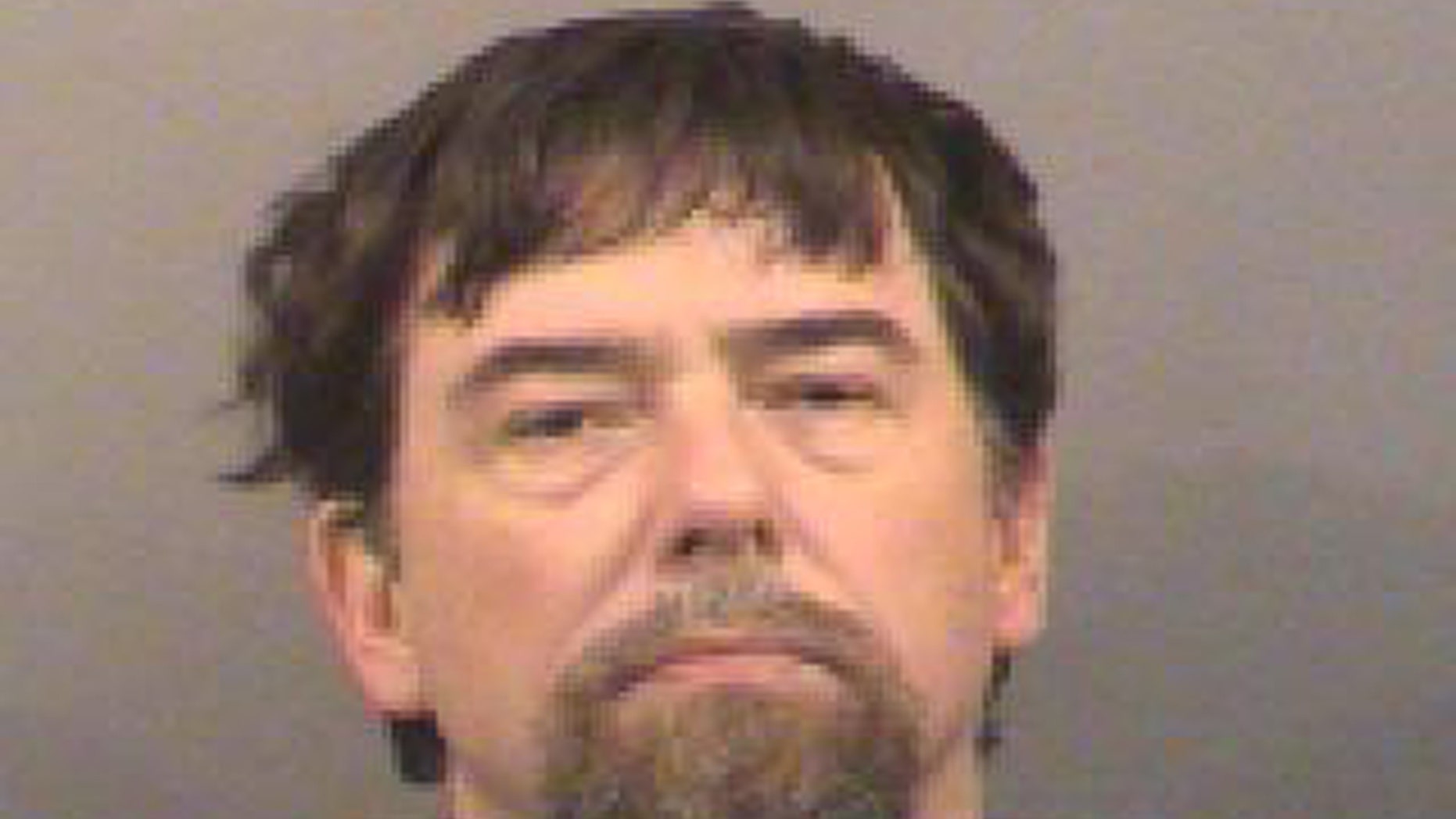 In this undated photo provided by the Sedgwick County, Kan., Clerk’s Office, a booking mugshot of Terry Lee Loewen is seen. The 58-year-old avionics technician who worked at the airport for aviation firm Hawker Beechcraft, was arrested before dawn Friday, Dec 13, 2013, as he tried to enter the tarmac on Wichita’s Mid-Continent Regional airport in Wichita, Kan., in a vehicle he believed was loaded with high explosives. (AP Photo/Sedgwick County Clerk’s Office)