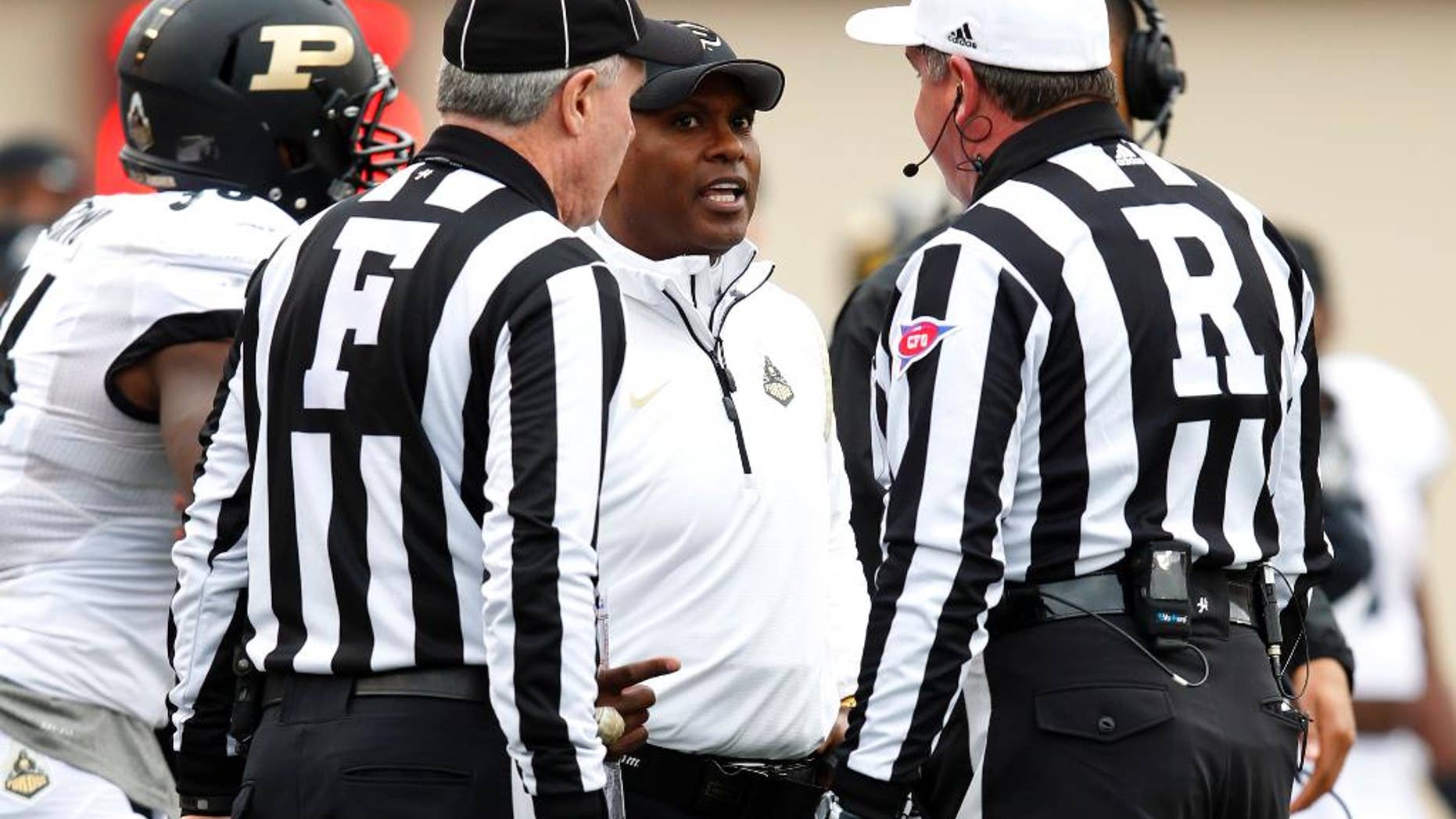 Purdue head coach Darrell Hazell reacts to a call by the officials during the second half of play against Indiana in an NCAA college football game at Memorial Stadium in Bloomington, Ind., Saturday, Nov. 29, 2014. (AP Photo/John Sommers II)