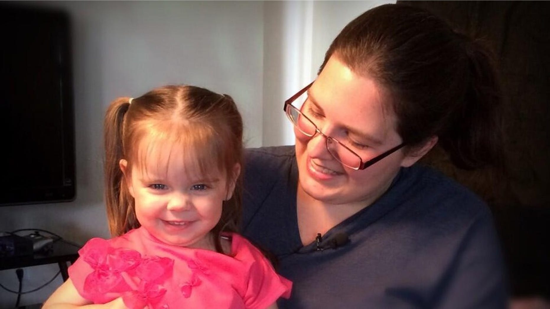 Arianna Moore (L) with her mother, Ashley Moore (R).