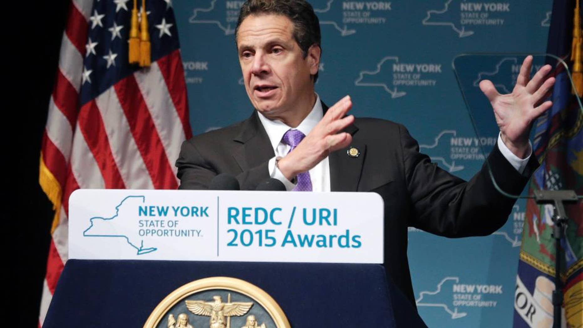 FILE - In this Dec. 10, 2015, file photo, New York Gov. Andrew Cuomo speaks during an economic development awards ceremony in Albany, N.Y. After the NYCLU filed its lawsuit in 2011, Cuomo saw it as an opportunity to improve New York's prison standards and instructed his staff to negotiate. New York prison officials agreed Wednesday, Dec. 16, 2015, to overhaul their use of solitary confinement, offering a broad slate of reforms aimed at reducing the number of inmates sent to "the box," limiting the amount of time they can spend there and providing counseling to help long-term solitary inmates adjust to life on the outside. (AP Photo/Mike Groll, File)