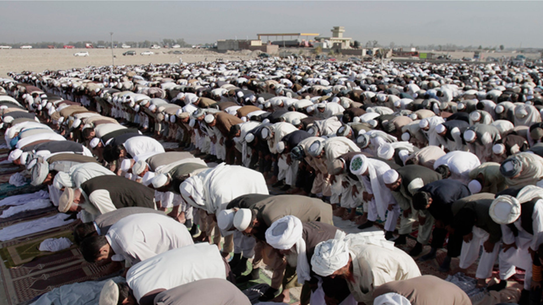 Oct. 26, 2012: Afghans offer Eid al-Adha prayers outside a mosque in the outskirt of Jalalabad east of Kabul, Afghanistan.