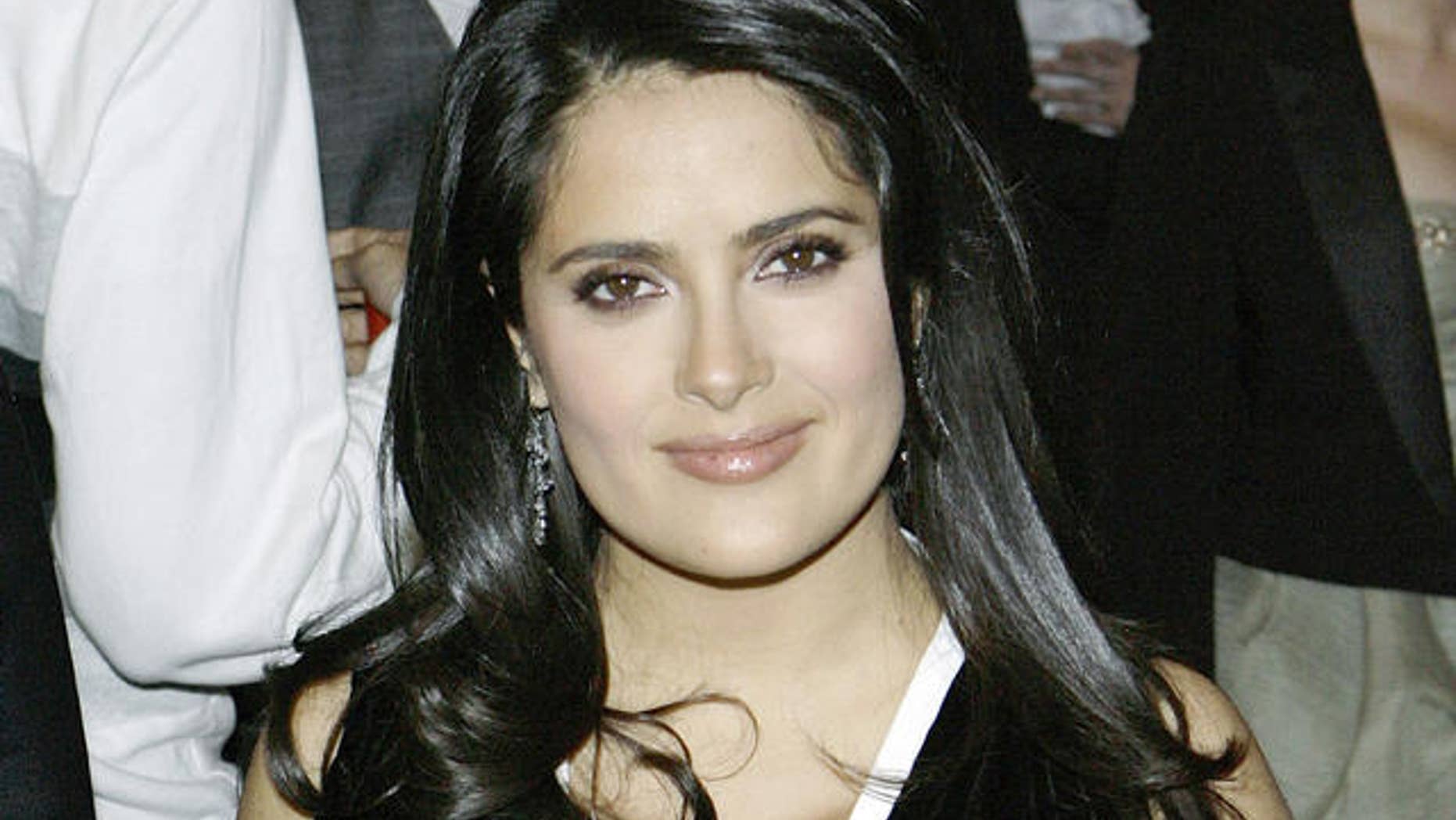 Actor Salma Hayek arrives at the Metropolitan Museum of Art Costume Institute Gala in New York, Monday, May, 7, 2007. ( AP Photo/Stuart Ramson)