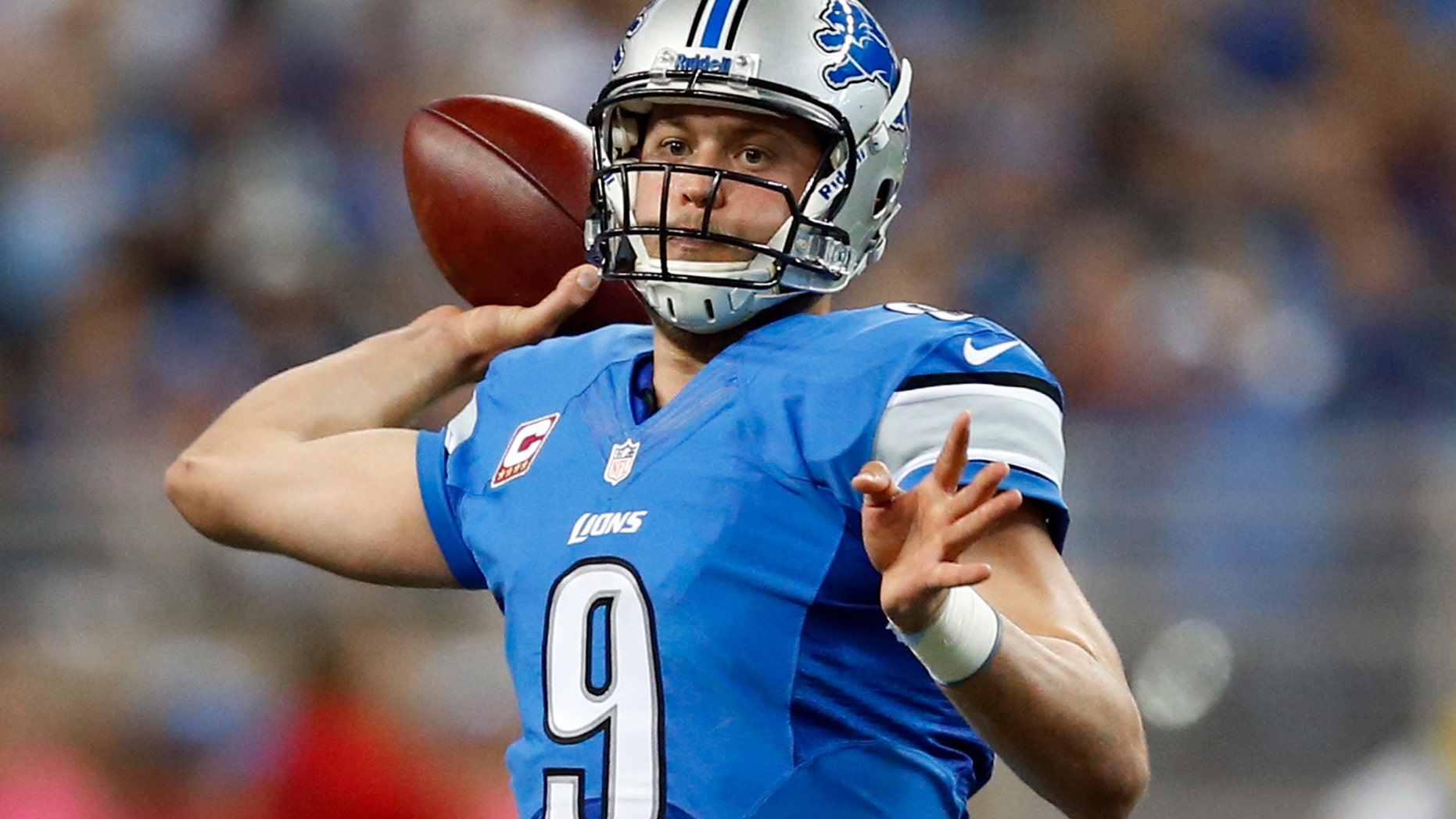Detroit Lions quarterback Matthew Stafford (9) throws in the first quarter of an NFL football game against the Cincinnati Bengals Sunday, Oct. 20, 2013, in Detroit. (AP Photo/Rick Osentoski)