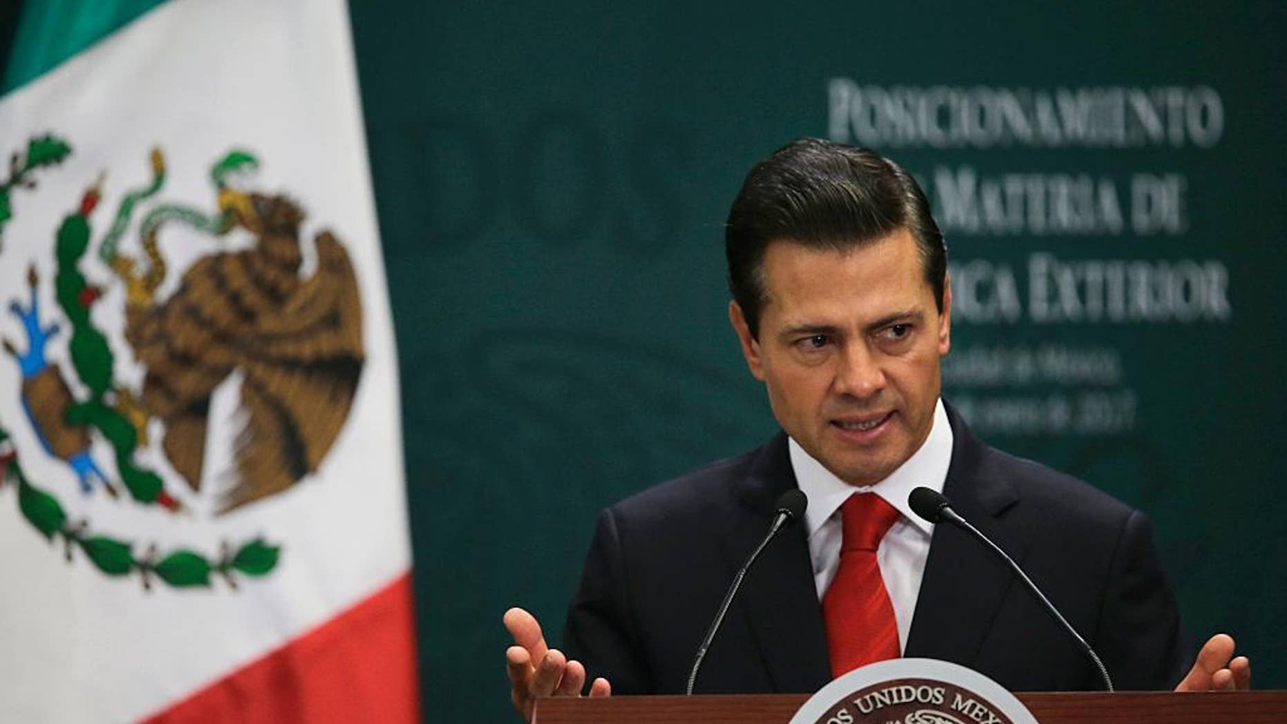Mexico's President Enrique Pena Nieto speaks during a press conference at Los Pinos presidential residence in Mexico City, Monday, Jan. 23, 2017. Pena Nieto said Monday that Mexico's attitude towards the Donald Trump administration should not be aggressive or biased, but one of dialogue. (AP Photo/Marco Ugarte)
