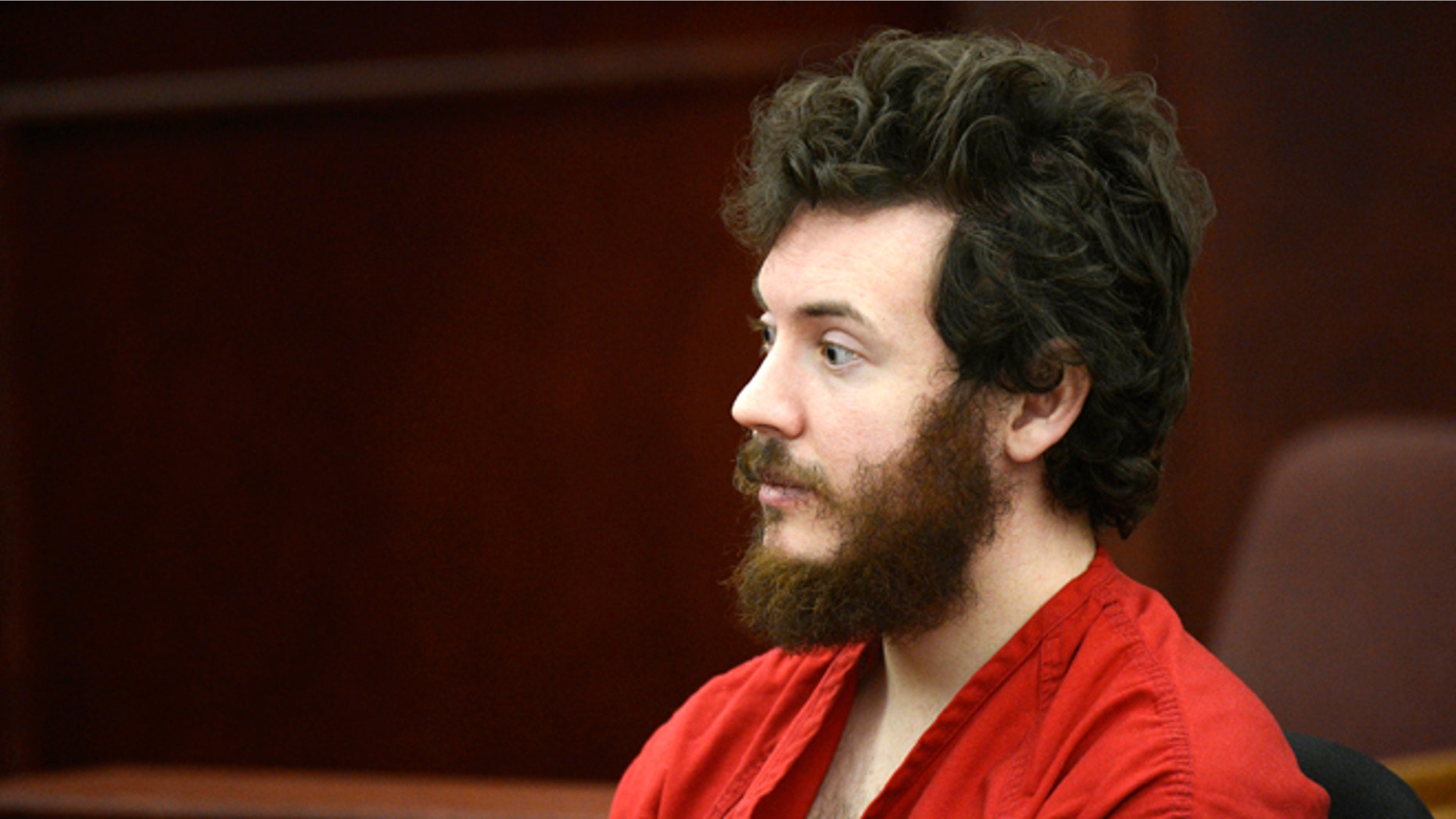 March 12, 2013: This file photo shows James Holmes, Aurora theater shooting suspect, in the courtroom during his arraignment in Centennial, Colo.