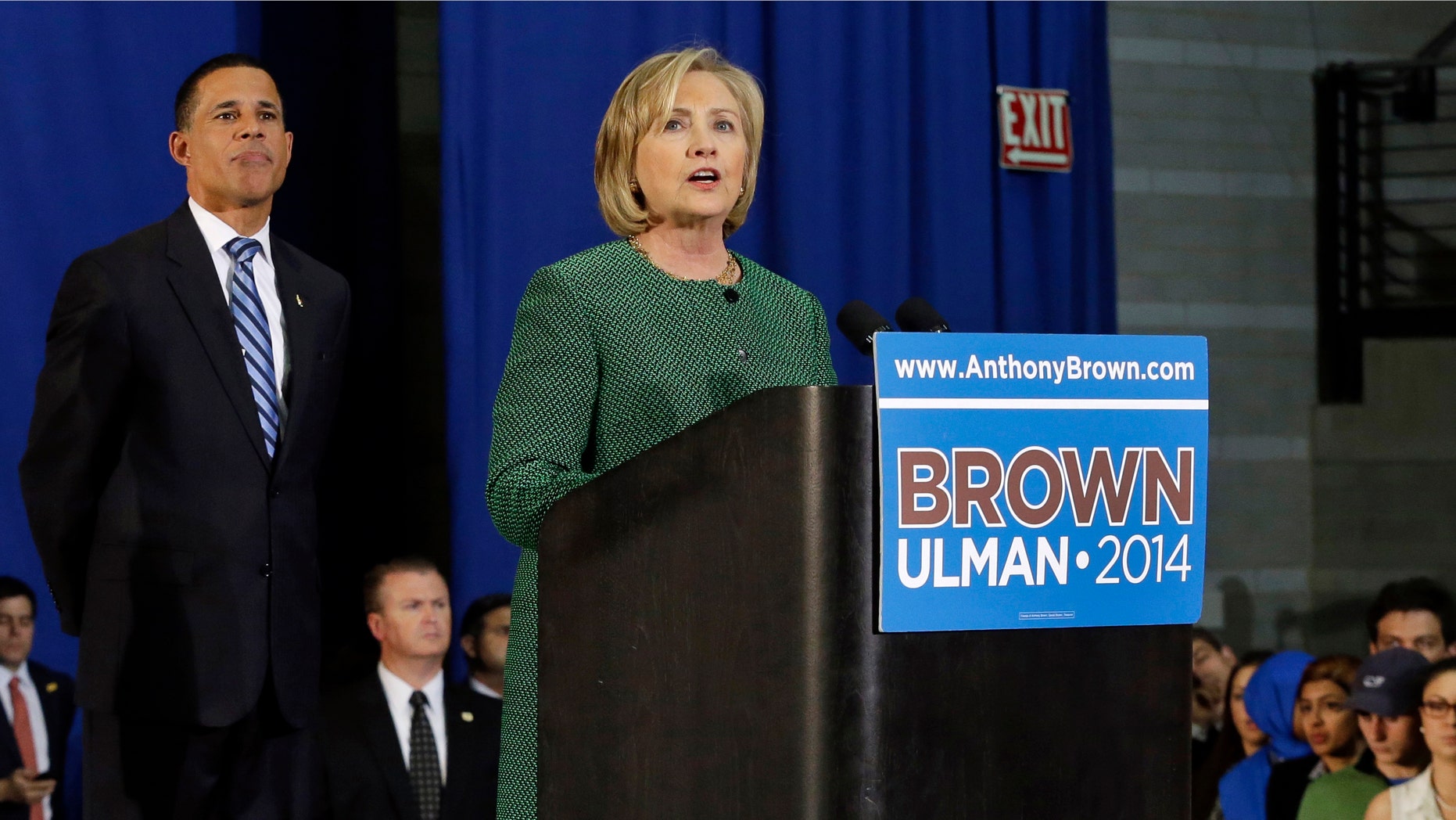 Former Secretary of State Hillary Rodham Clinton, right, campaigns for Maryland Democratic gubernatorial candidate, Lt. Gov. Anthony Brown, left, during a rally at the University of Maryland, Thursday, Oct. 30, 2014, in College Park, Md. (AP Photo/Patrick Semansky)
