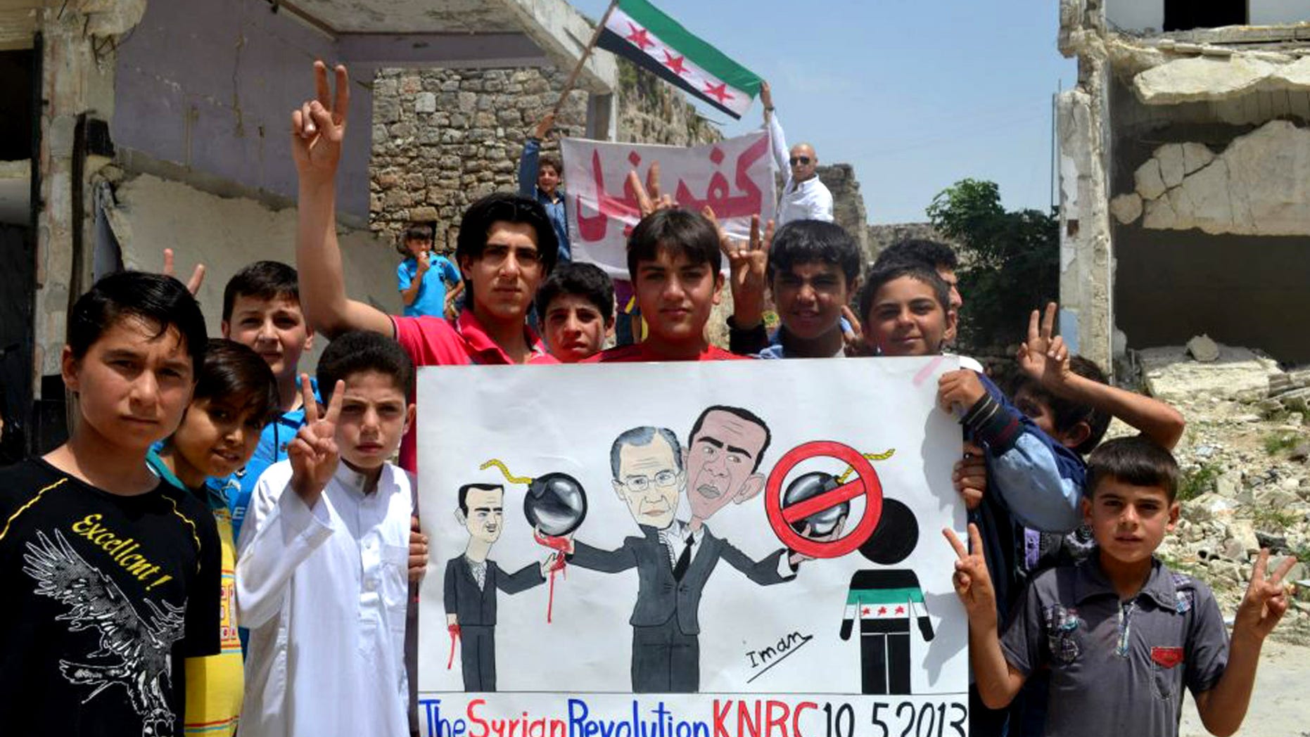 In this citizen journalism image provided by Edlib News Network, ENN, which has been authenticated based on its contents and other AP reporting, anti-Syrian regime protesters hold a poster depcting Syrian President Bashar Assad, left, Russian Foreign Minister Sergei Lavrov, center, and U.S. President Barack Obama, right during a demonstration, at Kafr Nabil town, in Idlib province, northern Syria, Friday May 10, 2013. Arabic on the banner background reads, "Kafr Nabil." (AP Photo/Edlib News Network ENN)